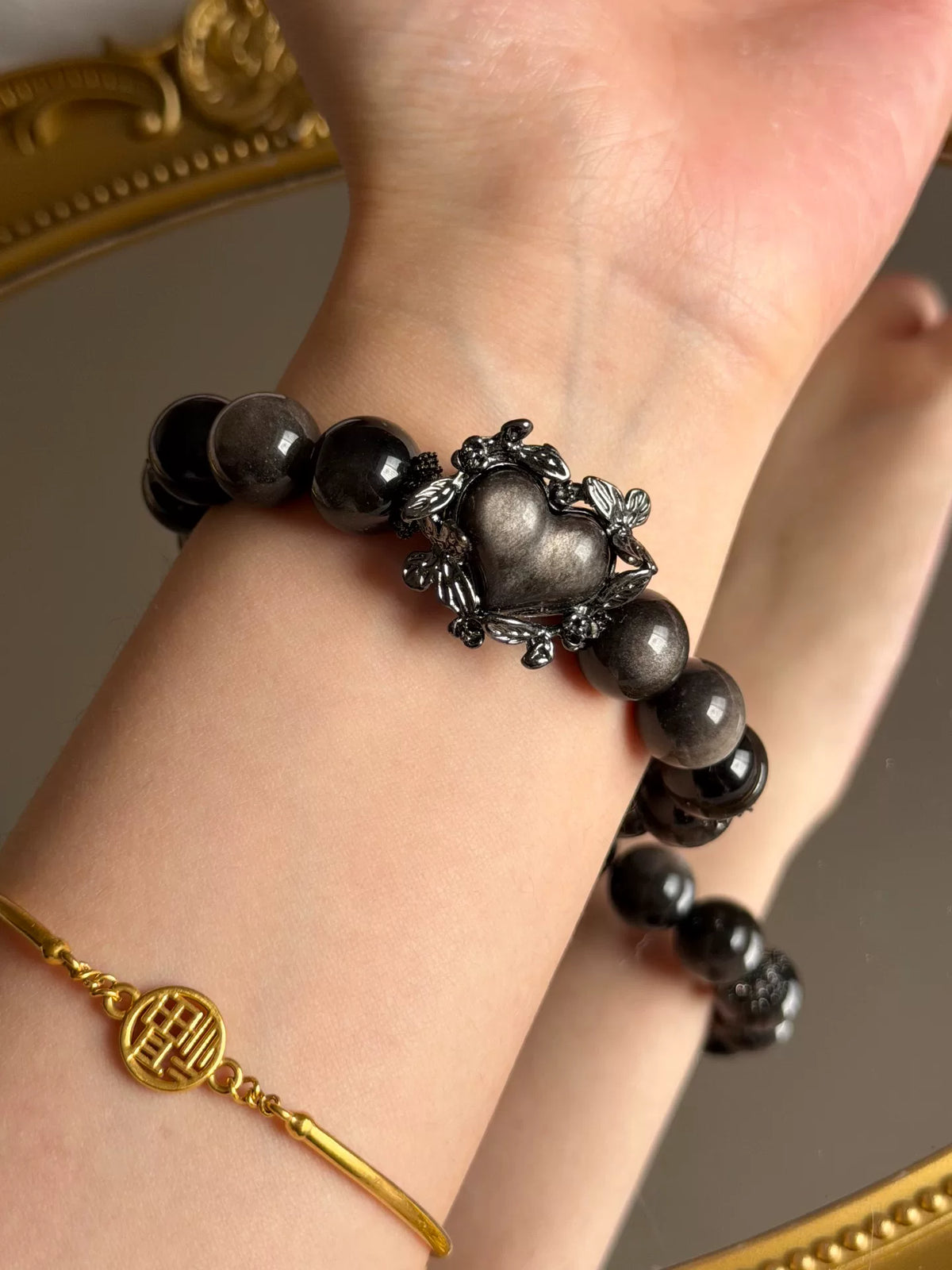 Armband van natuurlijke obsidiaan met zilverachtige glans 12mm