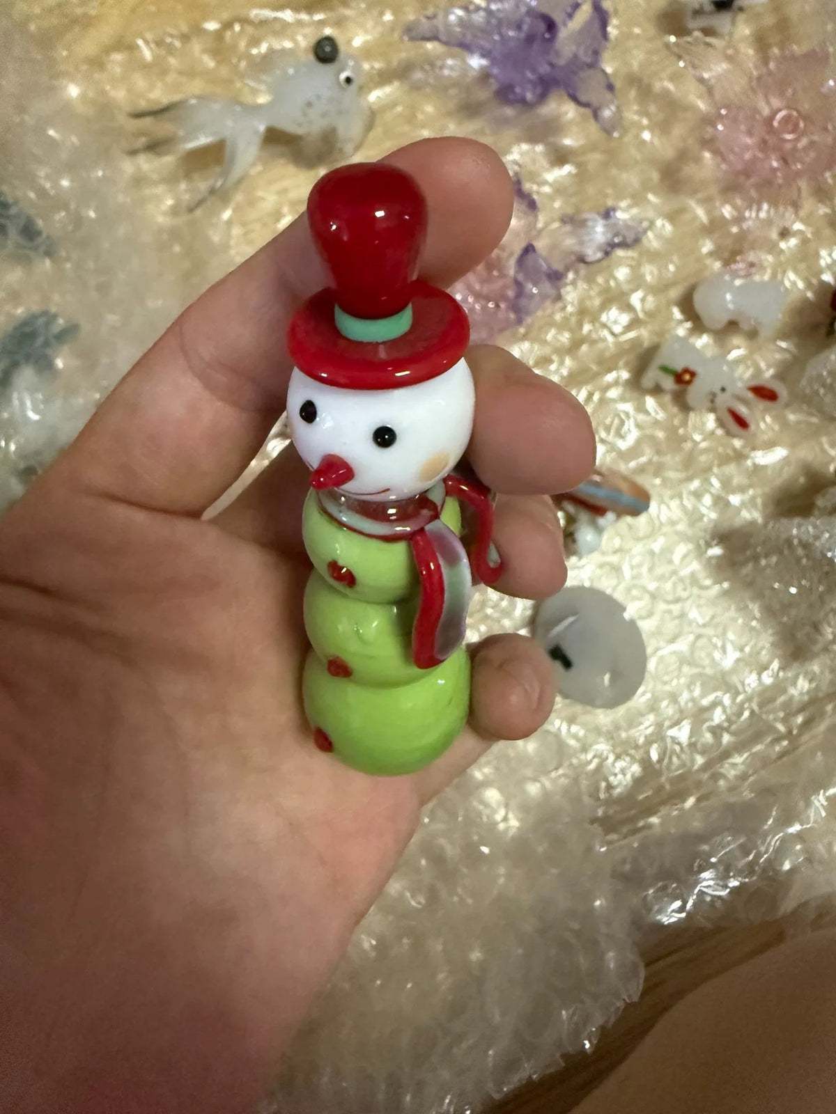 Figurine de bonhomme de neige en verre de liuli vert