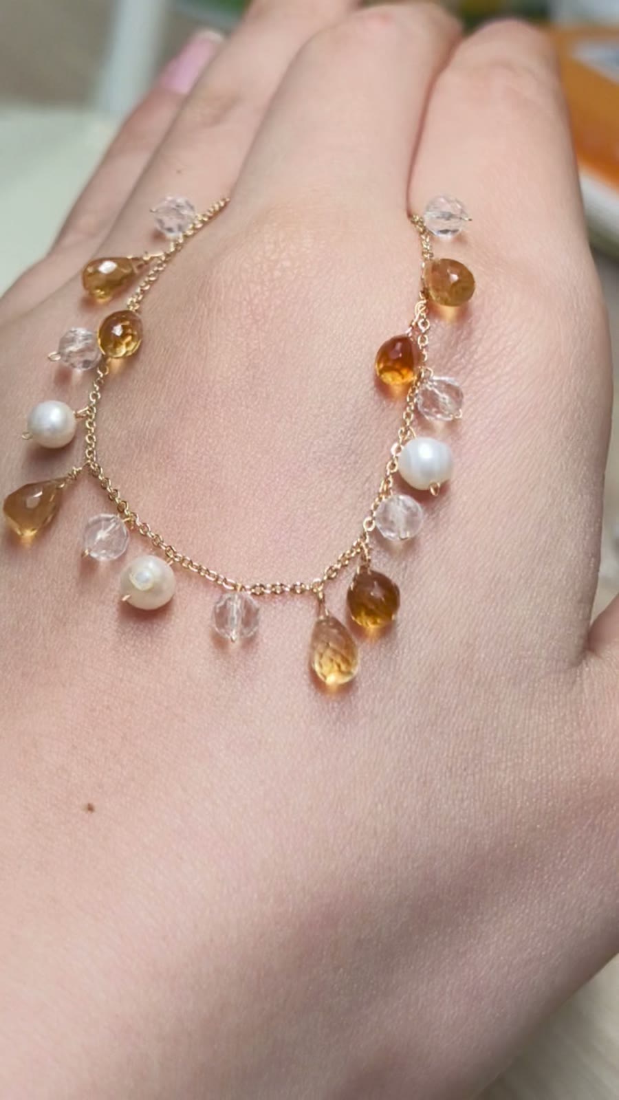 Pulsera de cadena en tonos dorados