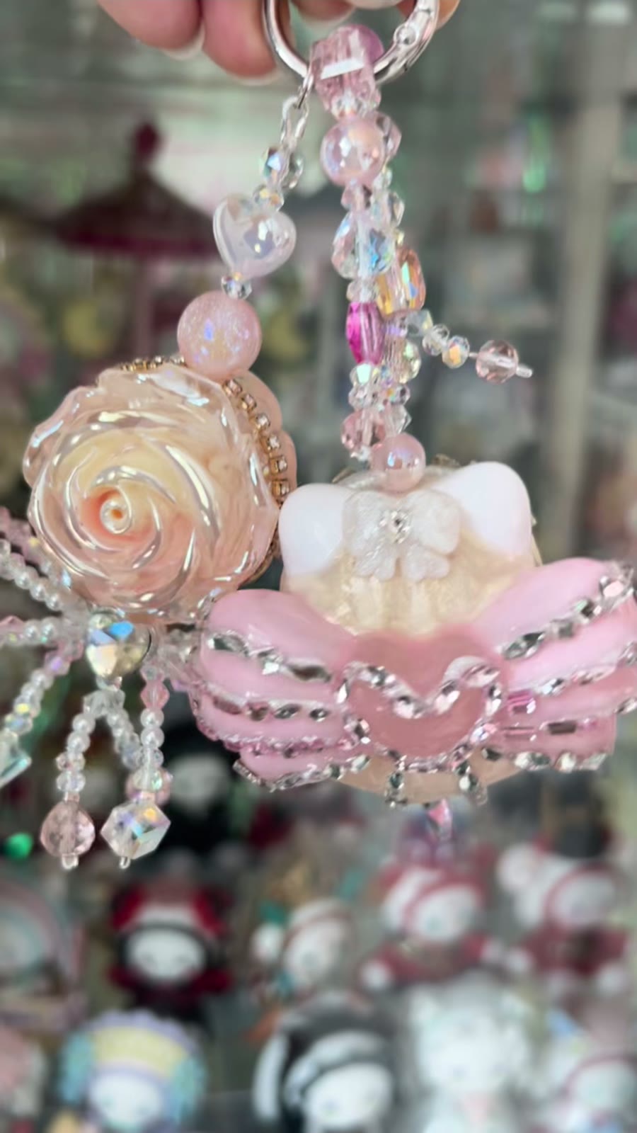 Roze Kraalpop Telefoonhanger met Strass Roos