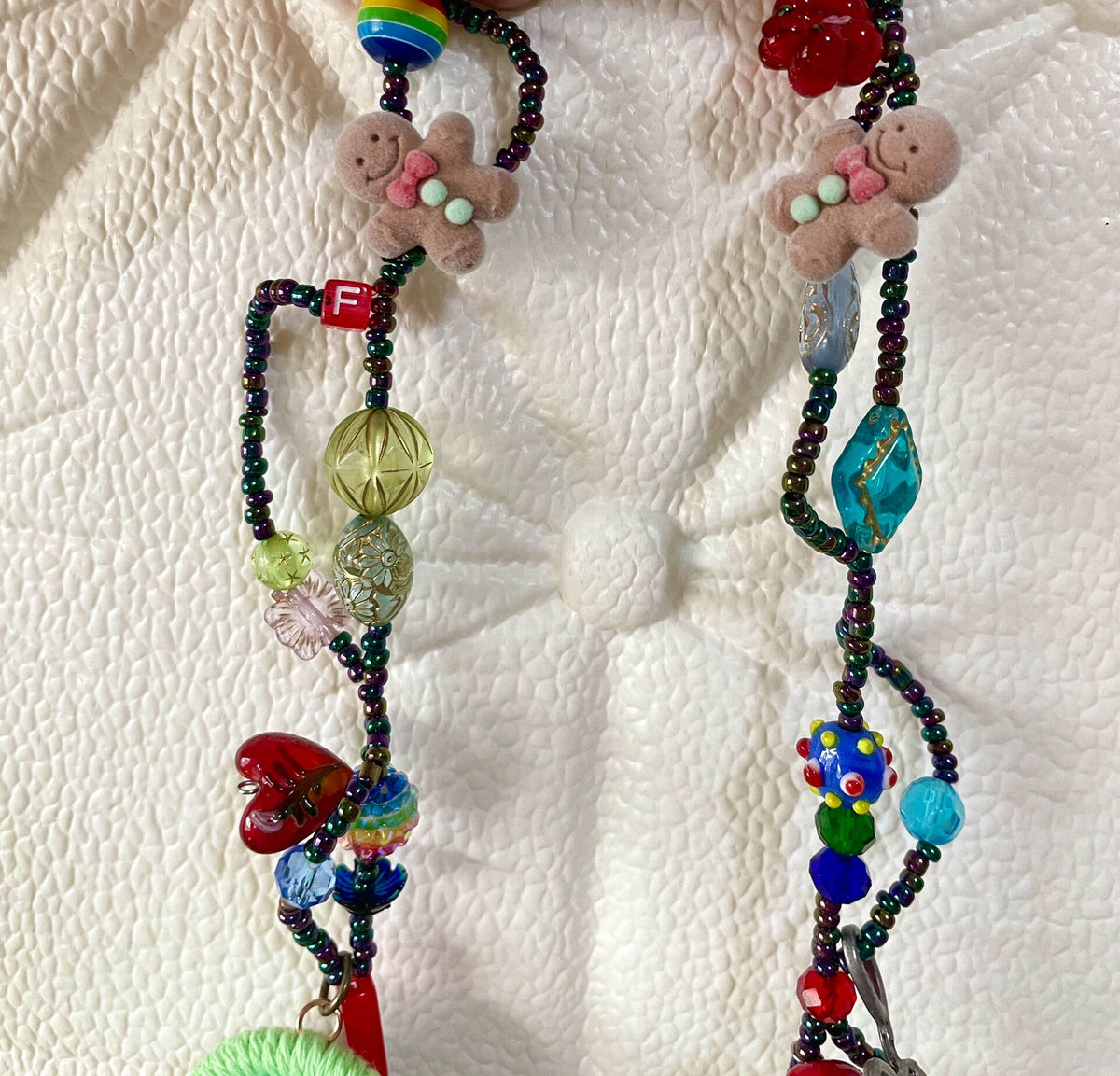 Multistrand Beaded Necklace with Figurine Pendant