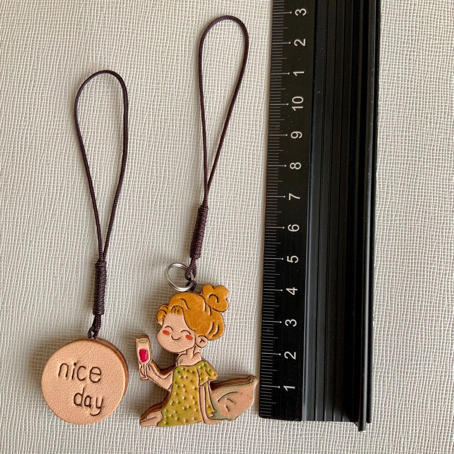 Leather Charm Set with Fairy Figure and "nice day" Disc