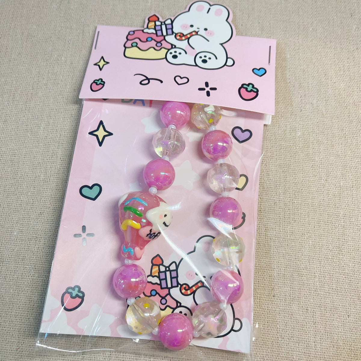 Pink Beaded Phone Strap with Cartoon Charm