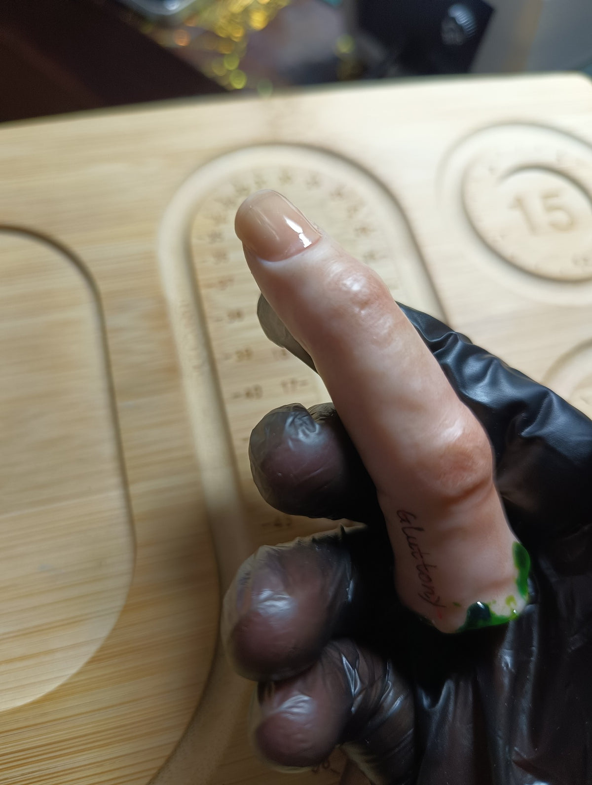 Clay Finger Pendant with Gluttony Tattoo