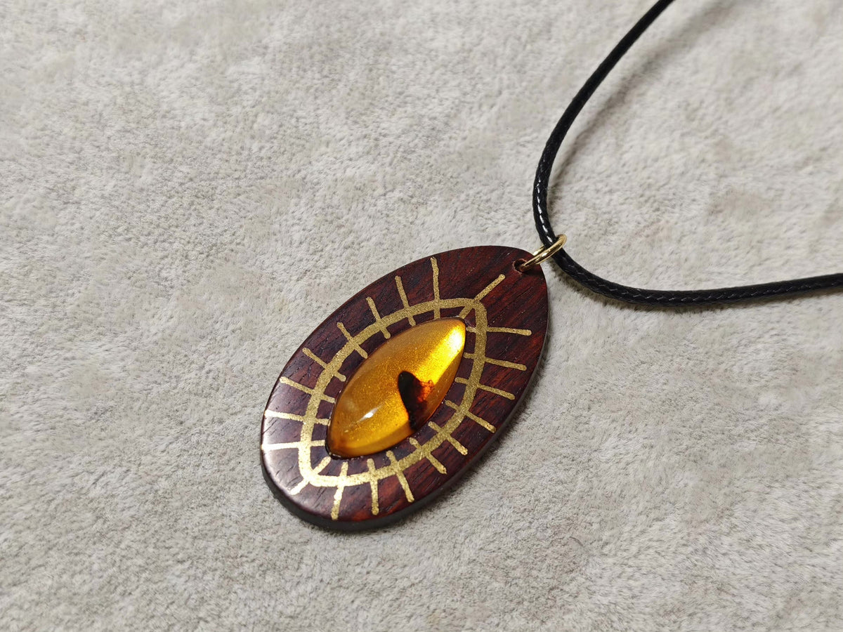 Myanmar Rosewood Amber Eye Pendant