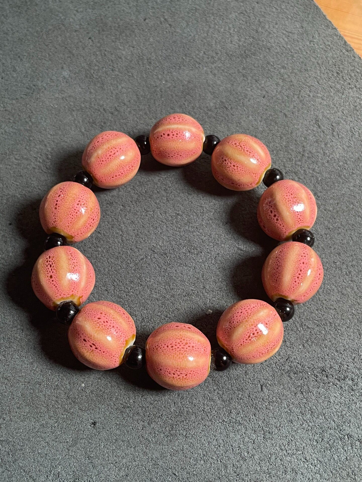 Porous Pink Bead Bracelet with Black Spacers