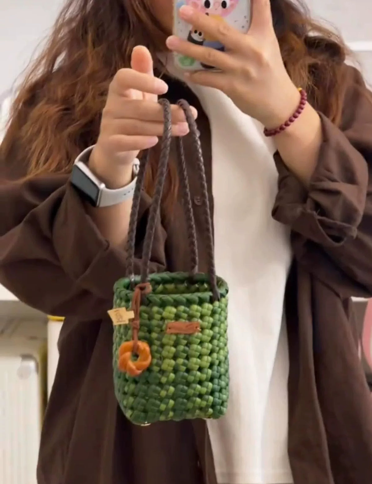 Borsa a secchio in rattan intrecciato verde
