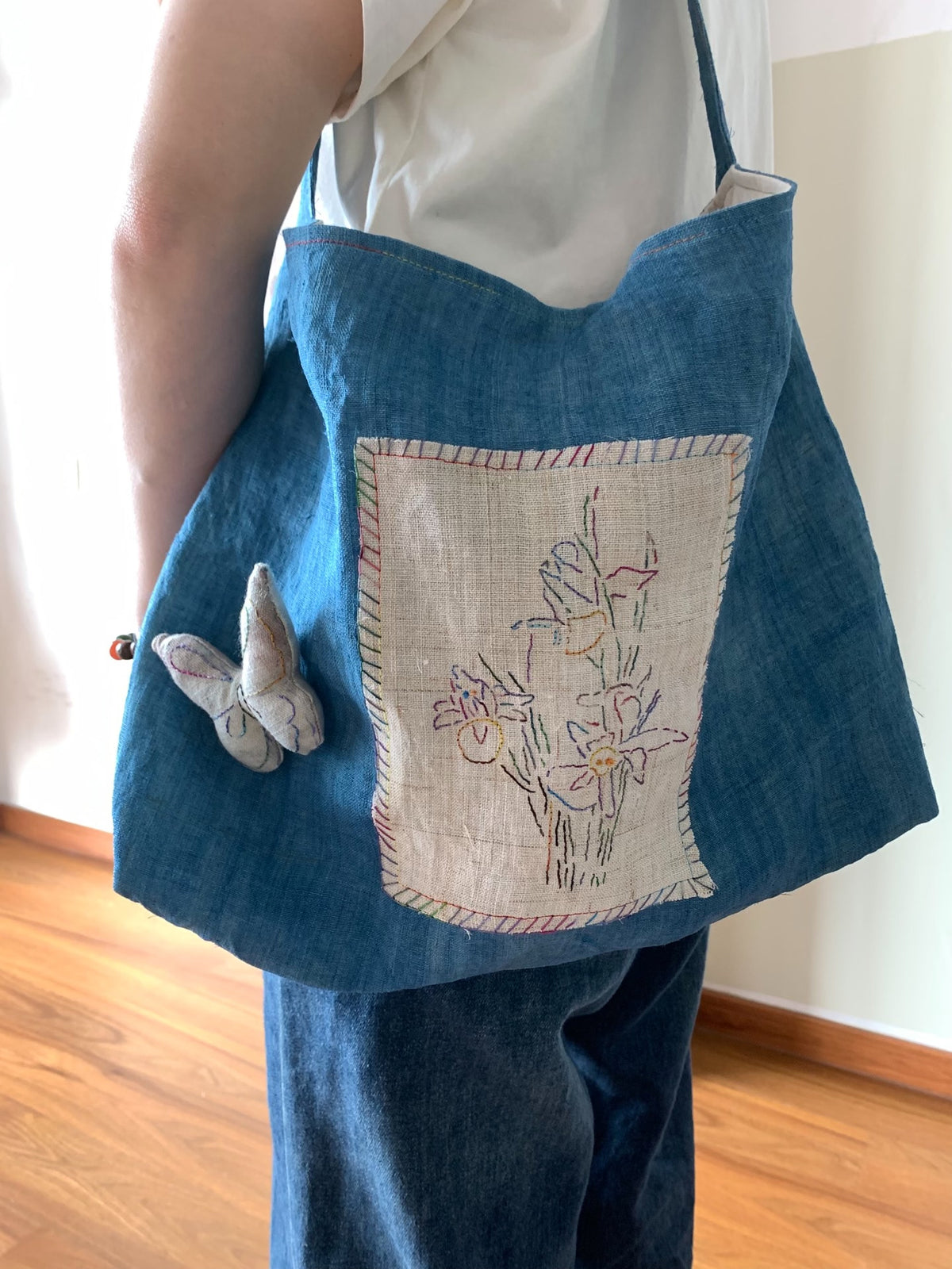 Handwoven Indigo Ramie Shoulder Bag with Iris Embroidery