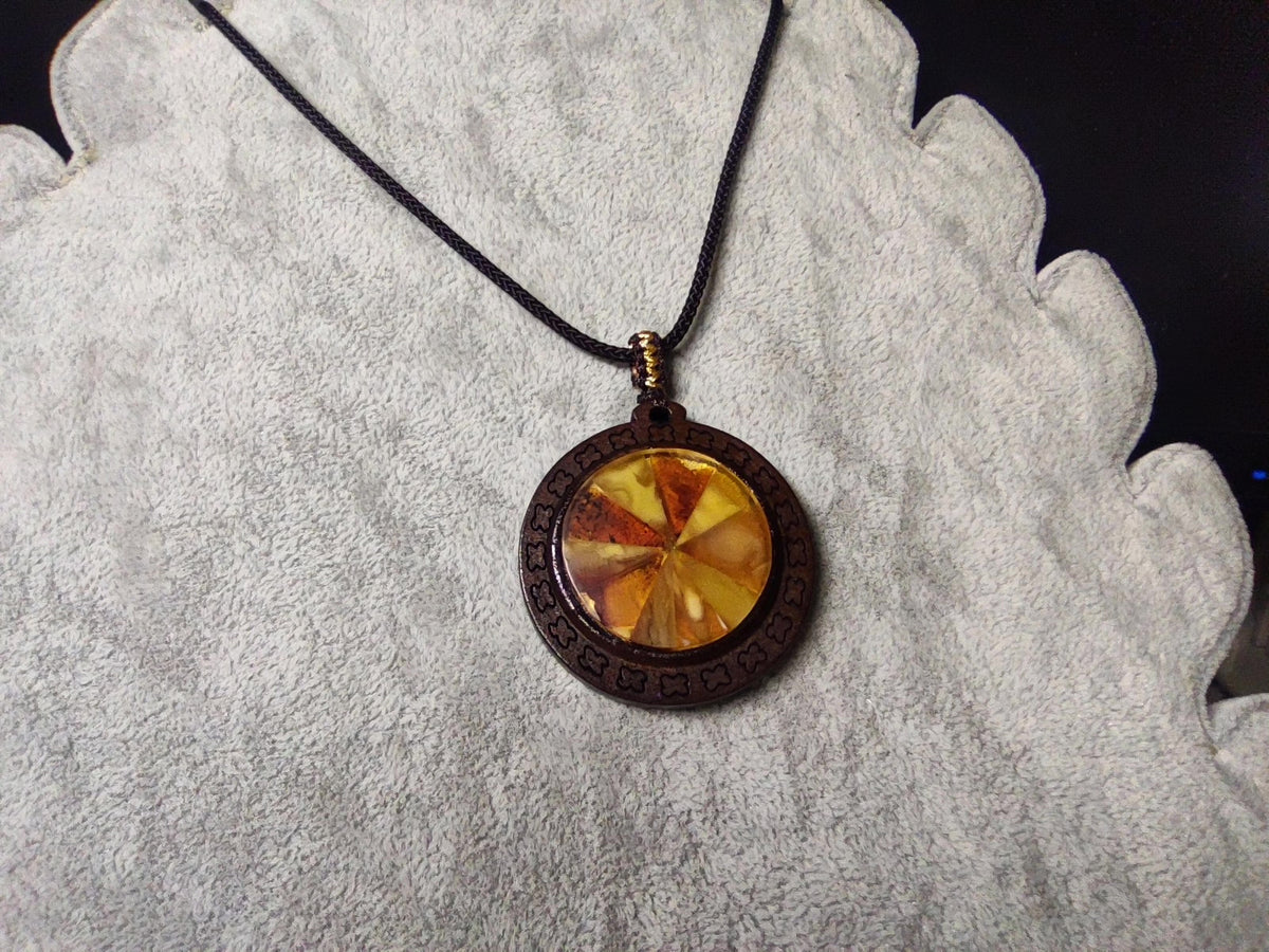 Spliced Amber Pendant with Wooden Frame