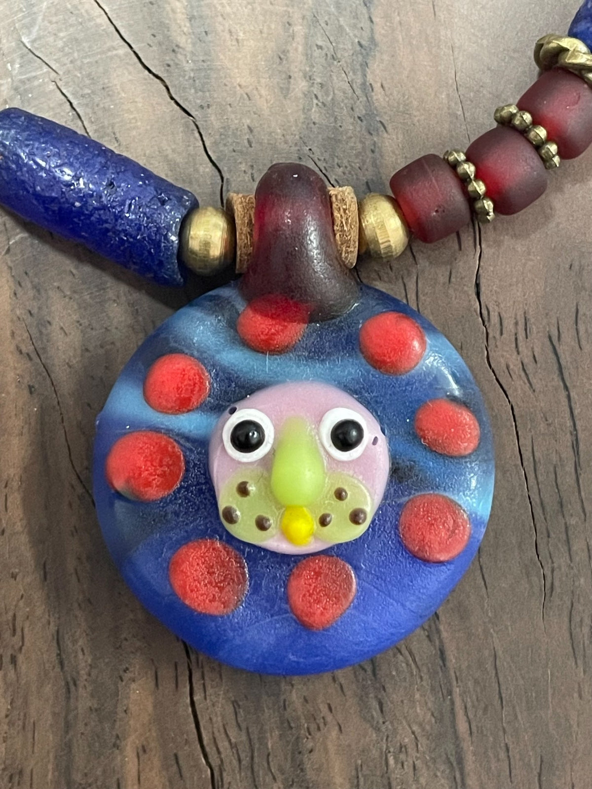 Phoenician Glass Lion Face Necklace