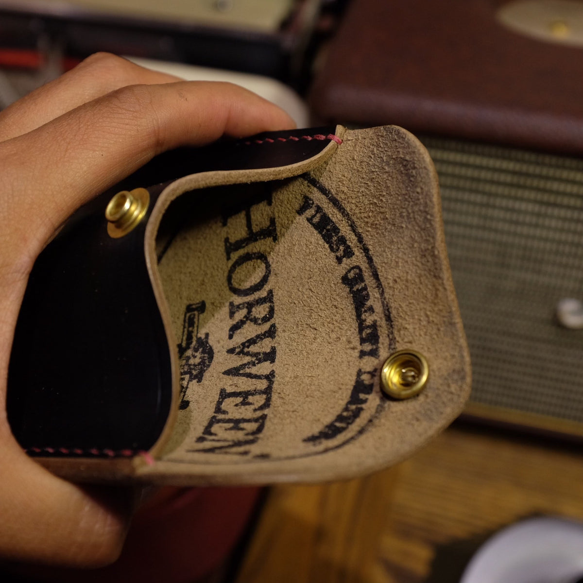 Black Horween Leather Bifold Wallet with Brass Snap Closure