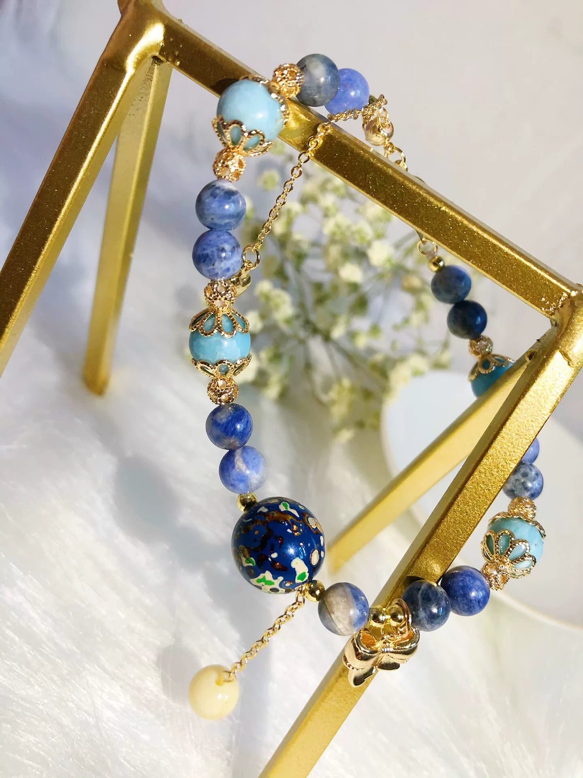 Braccialetto artigianale con perle in lacca