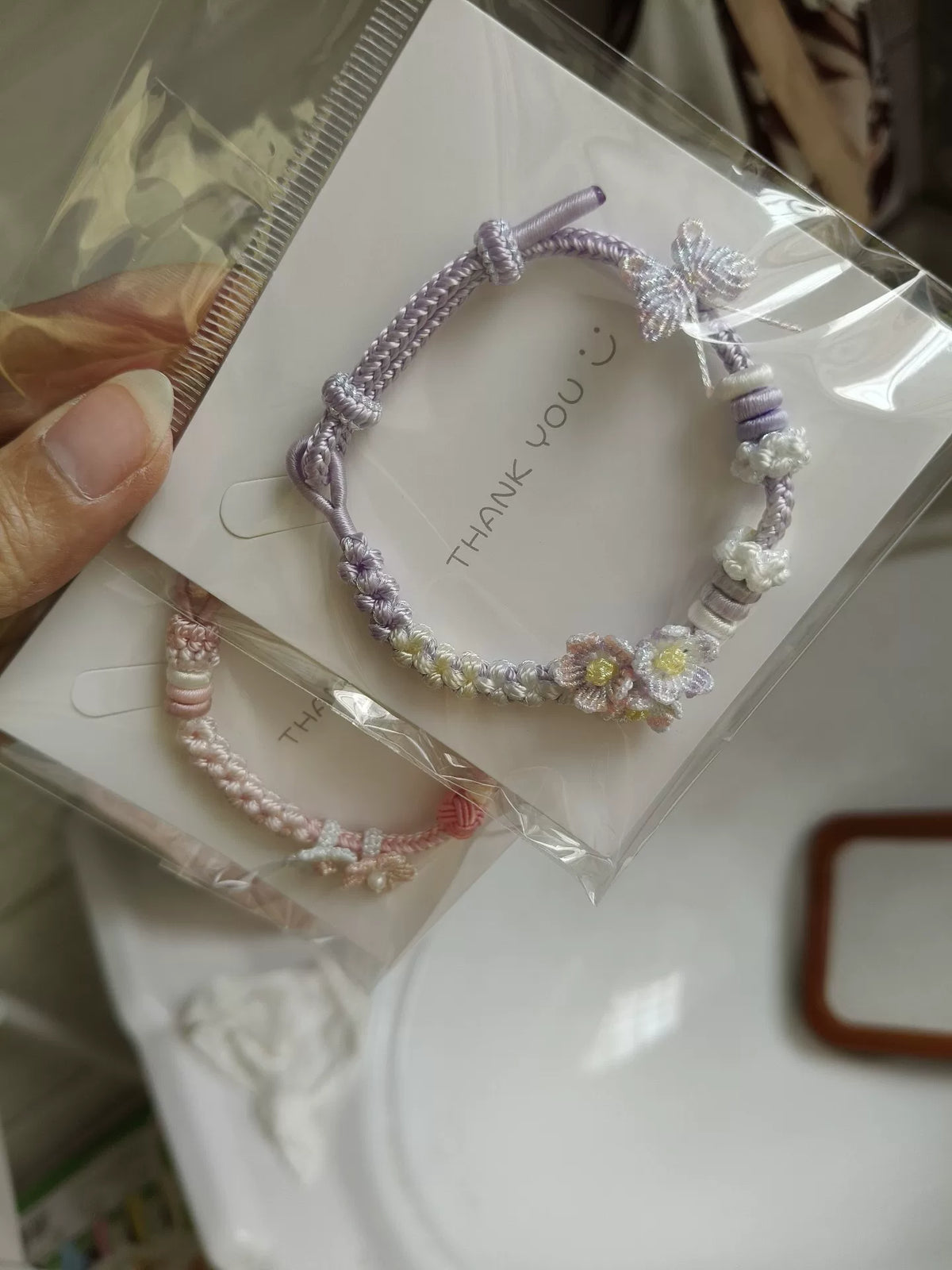 Handgemaakt geweven armband paars wit verloop