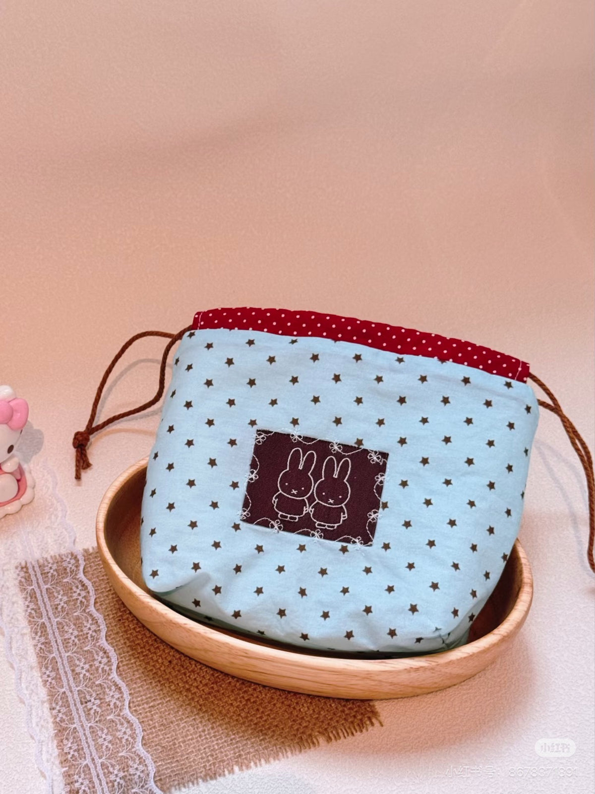 Pochette à cordon étoilée bleu clair