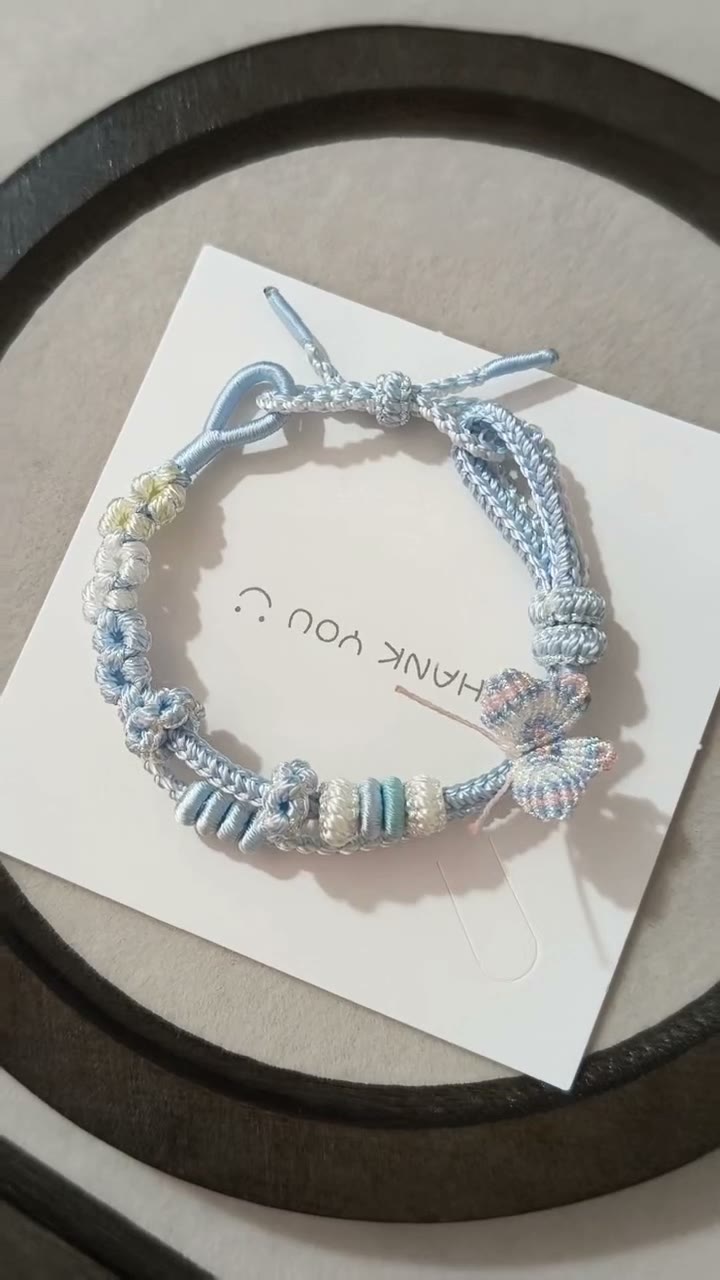 Handwoven Light Blue Bracelet with Floral Decor