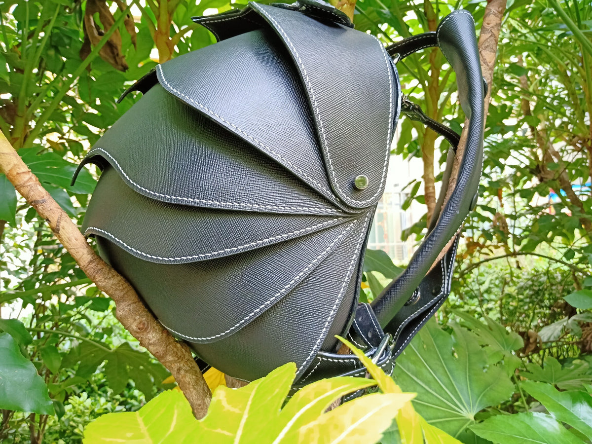Black Lychee Grain Cowhide Beetle Backpack