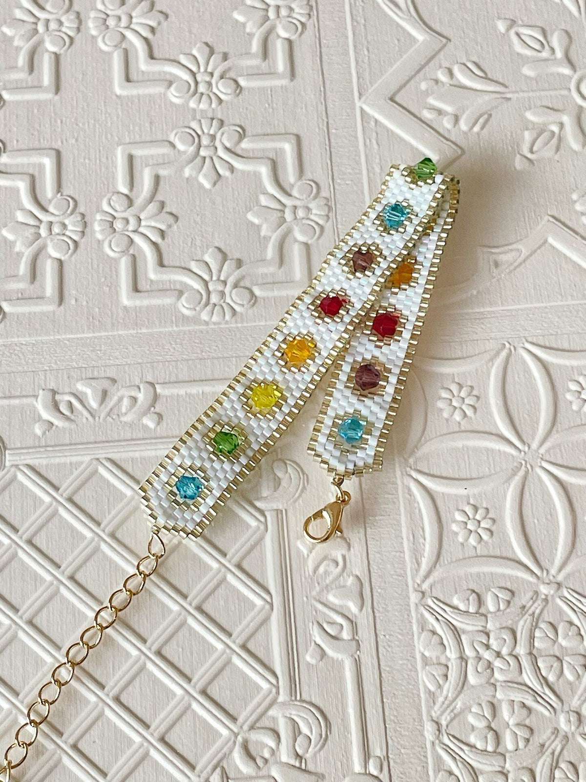 White Beaded Bracelet with Rainbow Accents