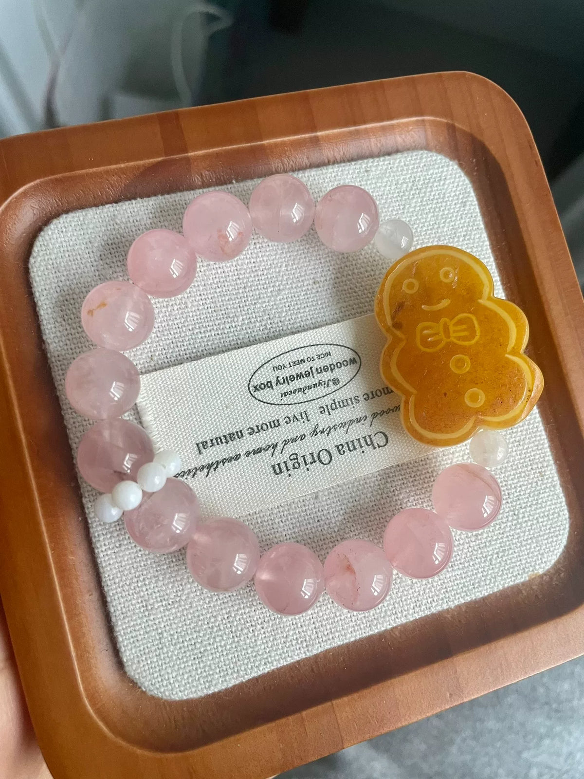 Bernstein Lebkuchenmann Rosenquarz-Armband