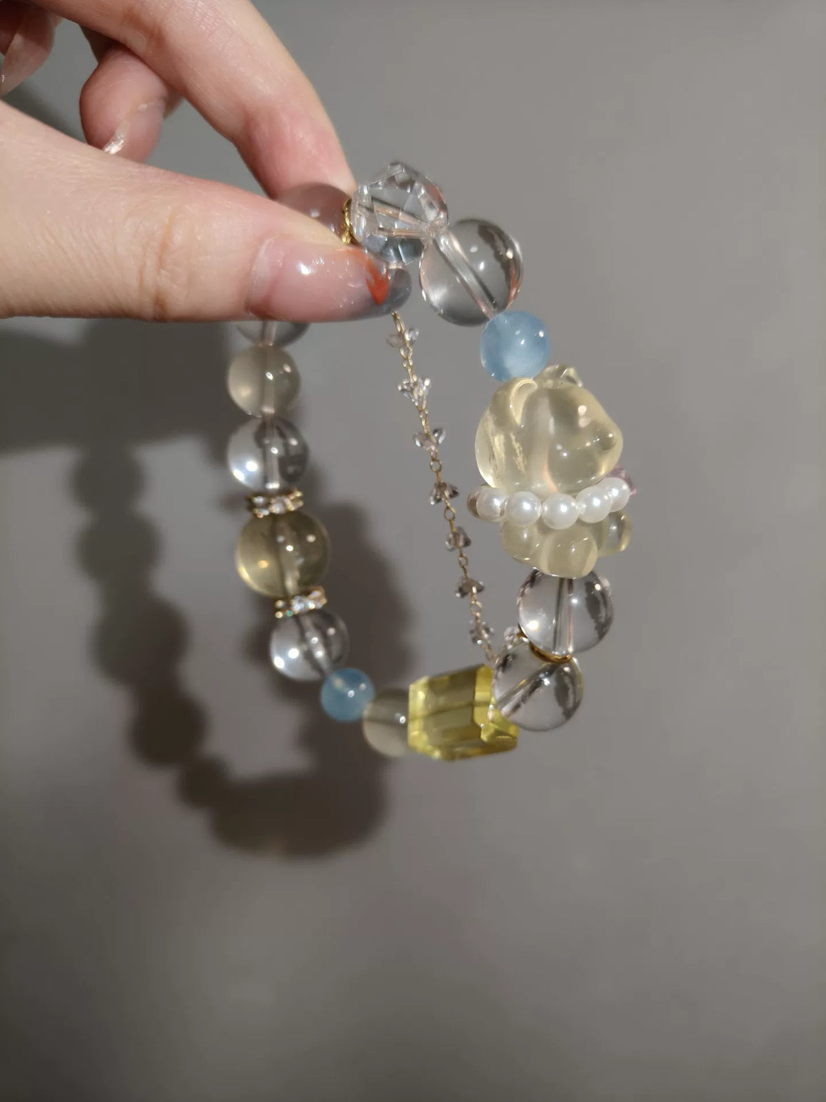 Bracciale a perline con orsetto in citrino e acquamarina