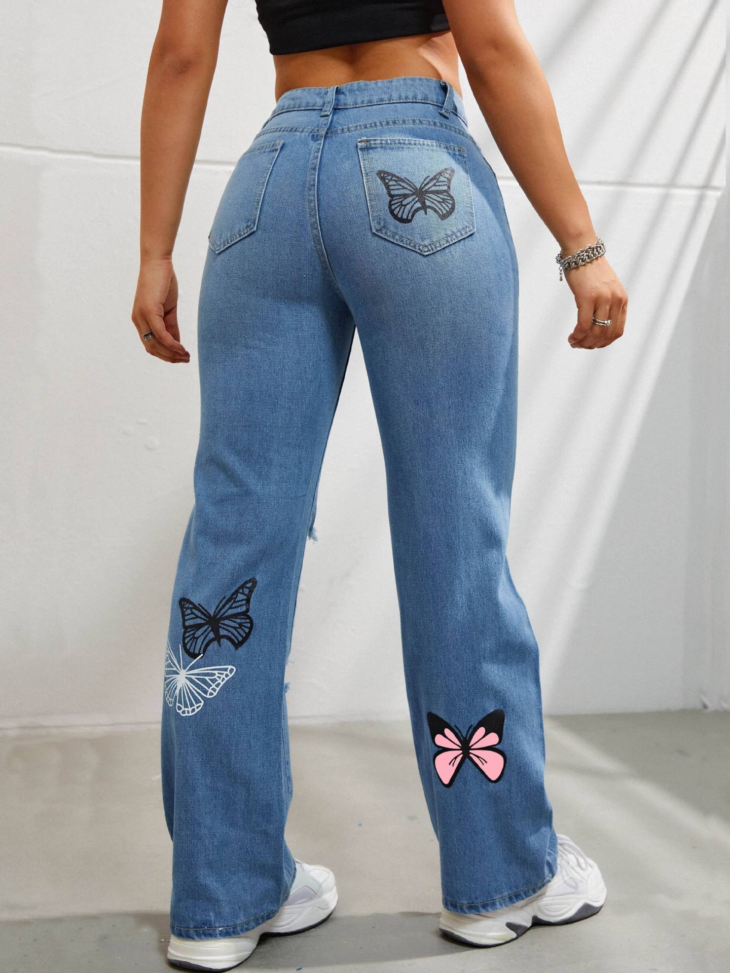 pantalon en denim déchiré à imprimé papillons 🦋
