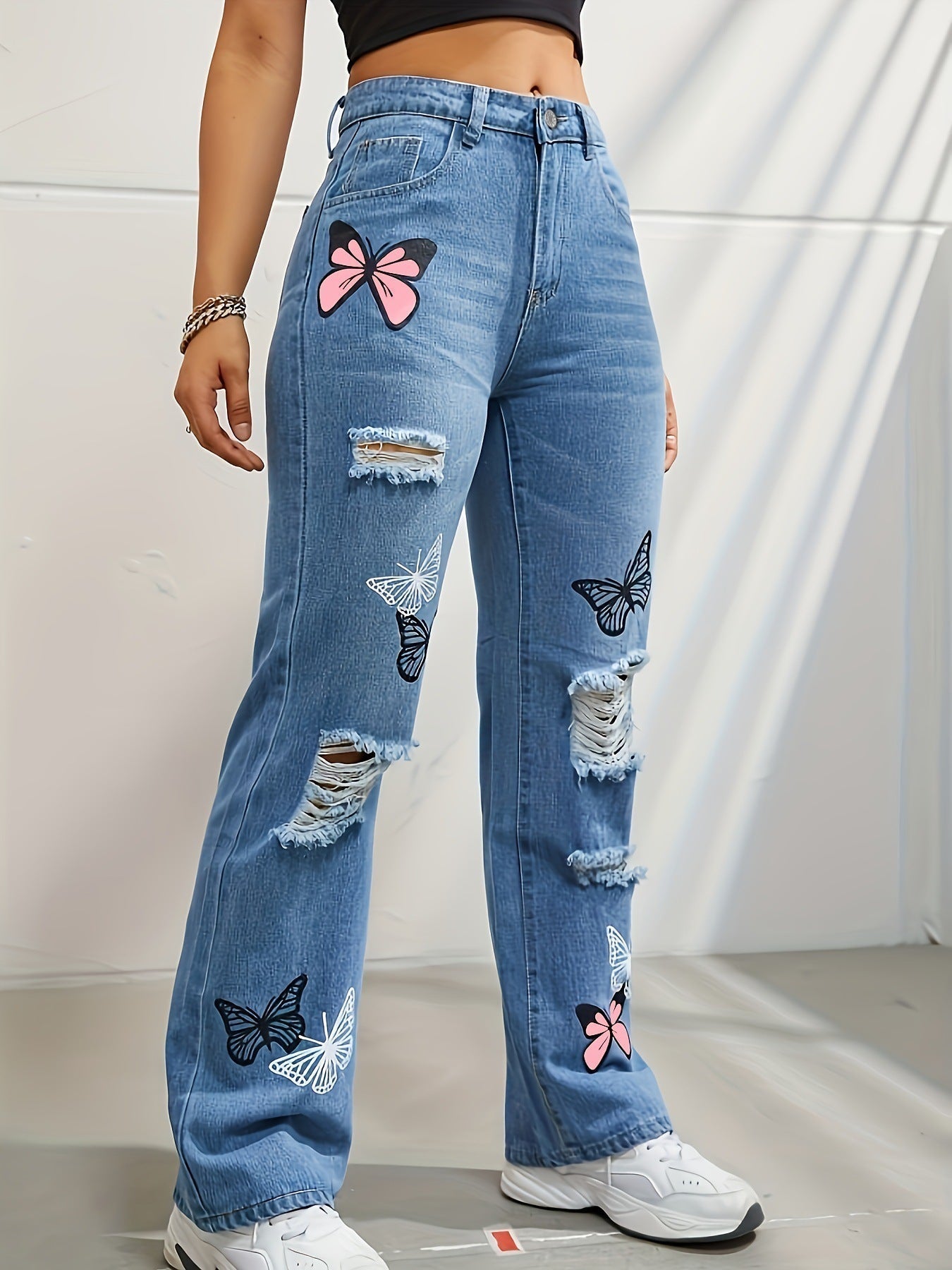 pantalon en denim déchiré à imprimé papillons 🦋