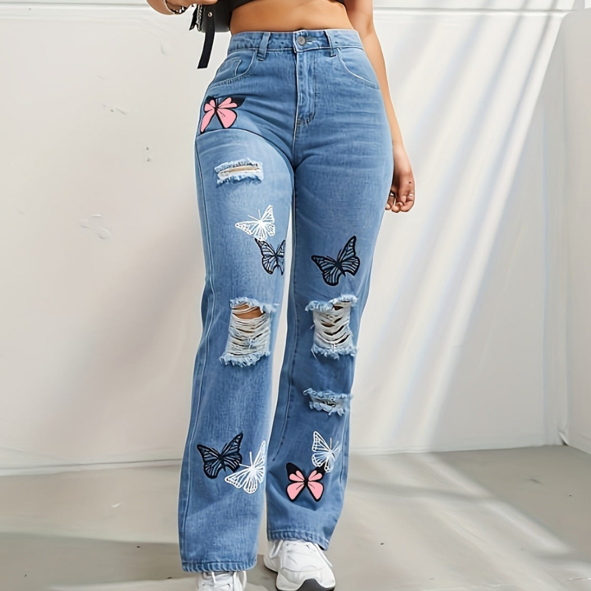 pantalon en denim déchiré à imprimé papillons 🦋