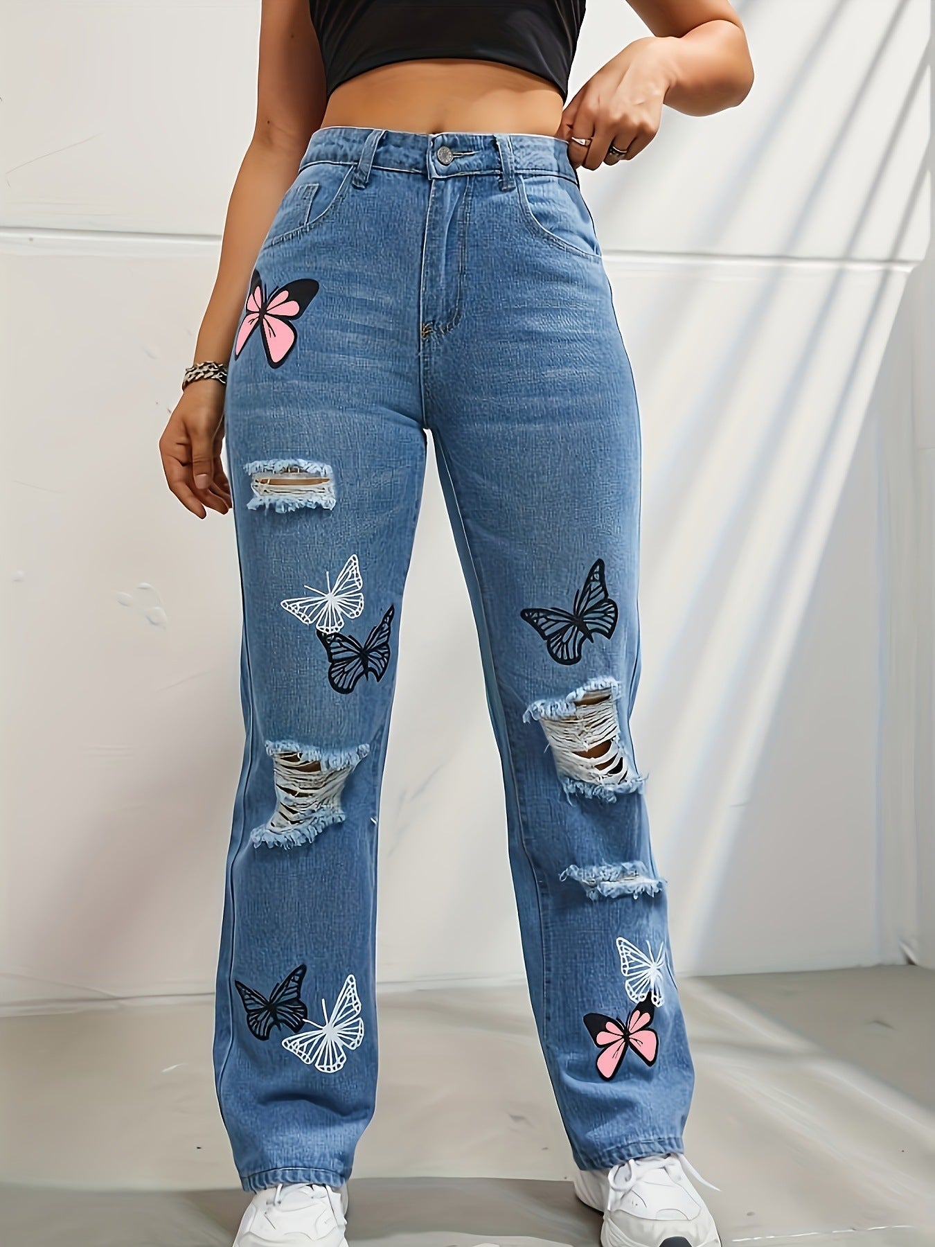 pantalon en denim déchiré à imprimé papillons 🦋