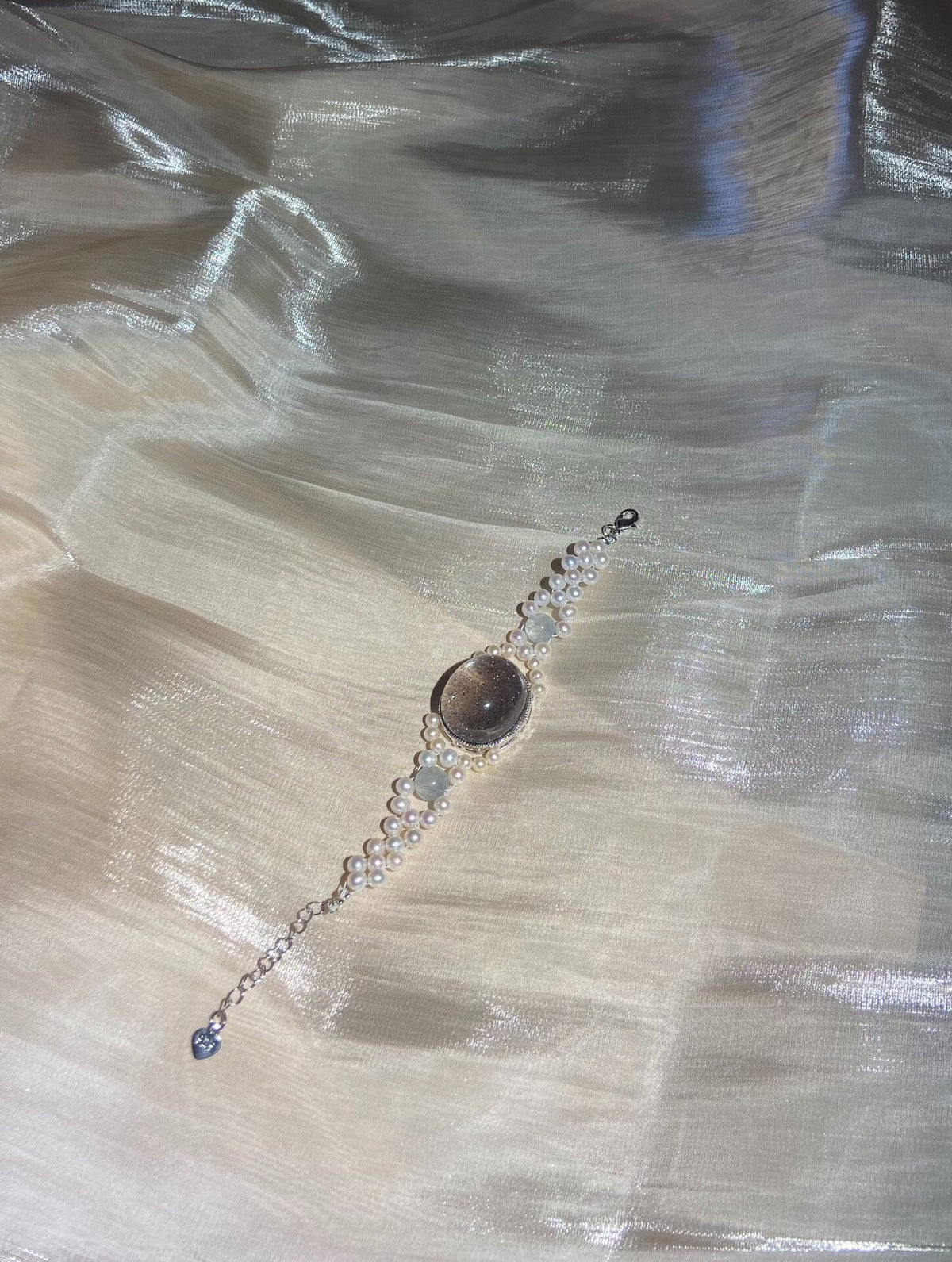 Blue Gold Sand Crystal Oval Bead Bracelet