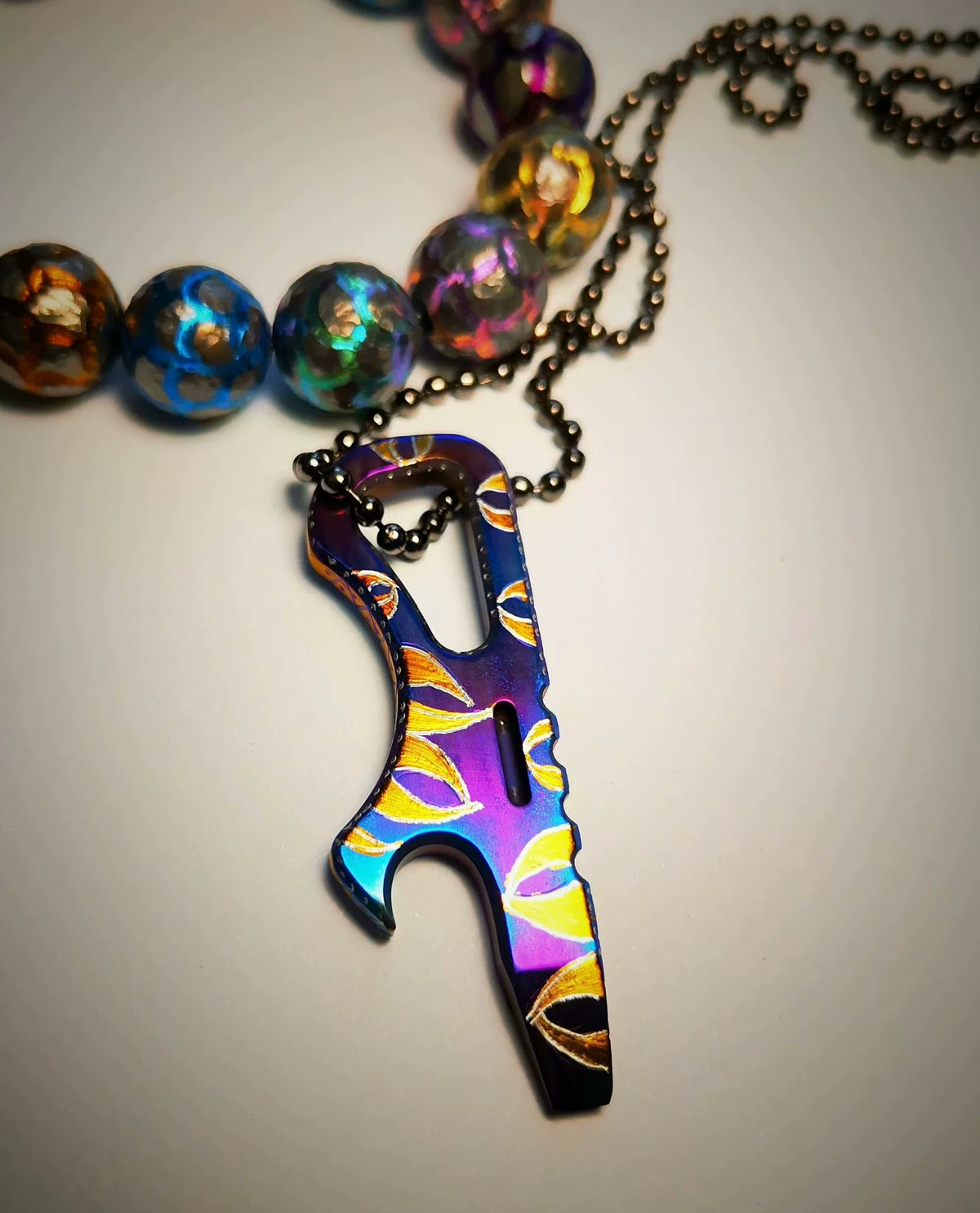Pendentif porte-clés ouvre-bouteille en titane