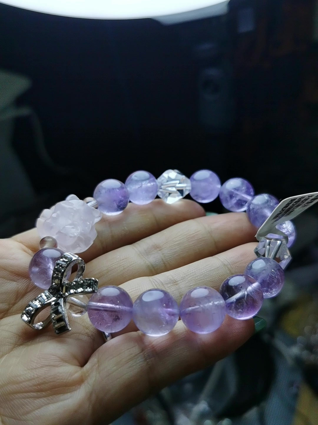 Armband i lila ametist med rosa rävshäng