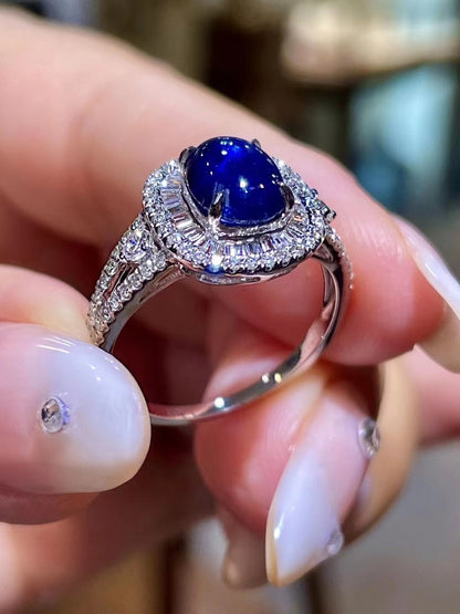 1.91ct Oval Cabochon Sapphire Double Halo Diamond Ring in 18K Gold