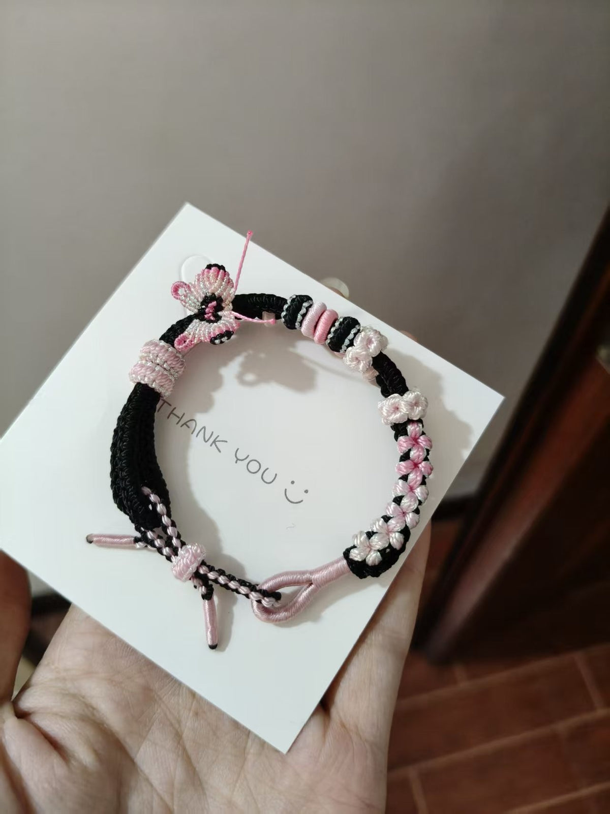 Handwoven Black Pink Gradient Bracelet with Butterfly Charm