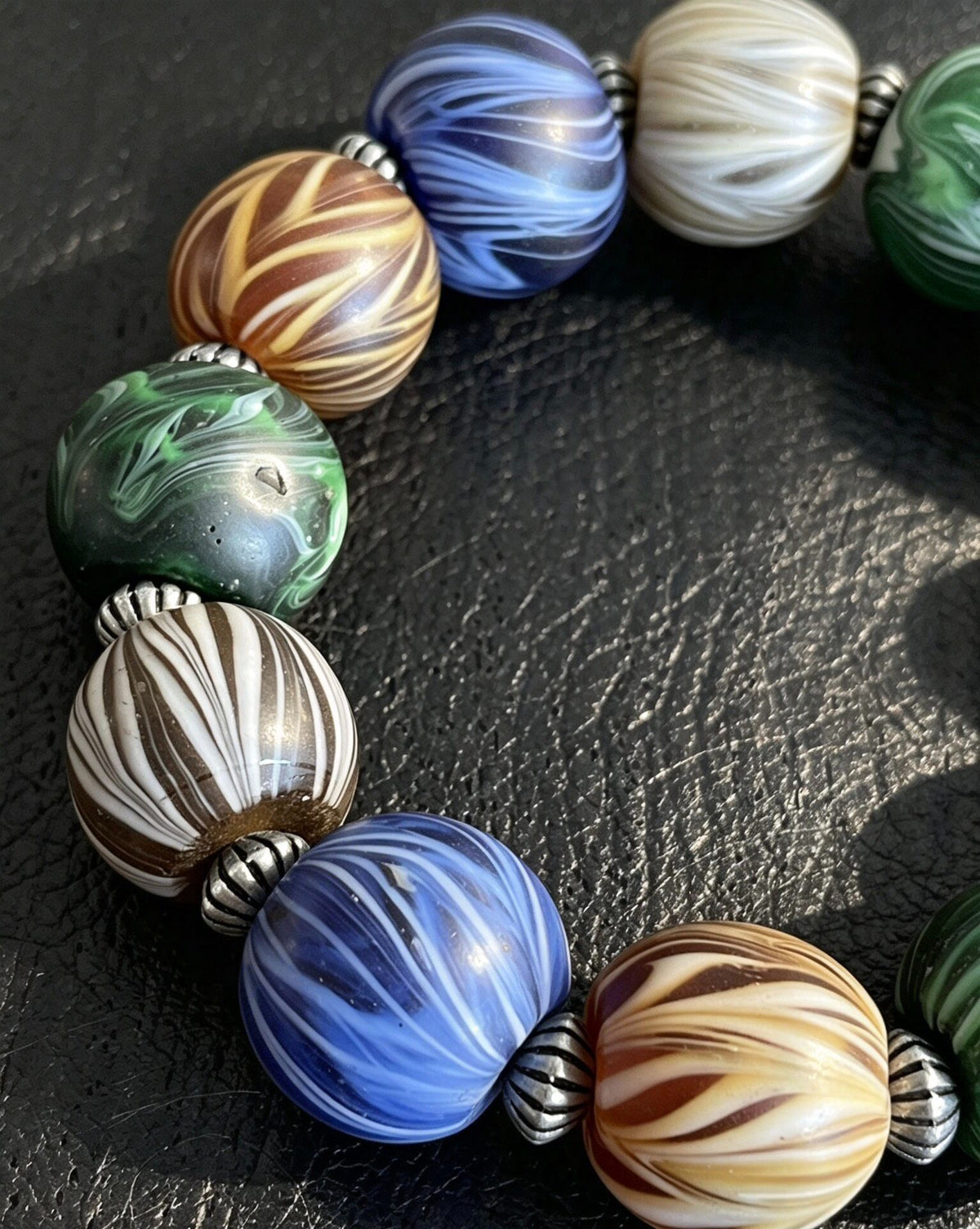 Multicolored Glass Bead Bracelet with Metal Spacers