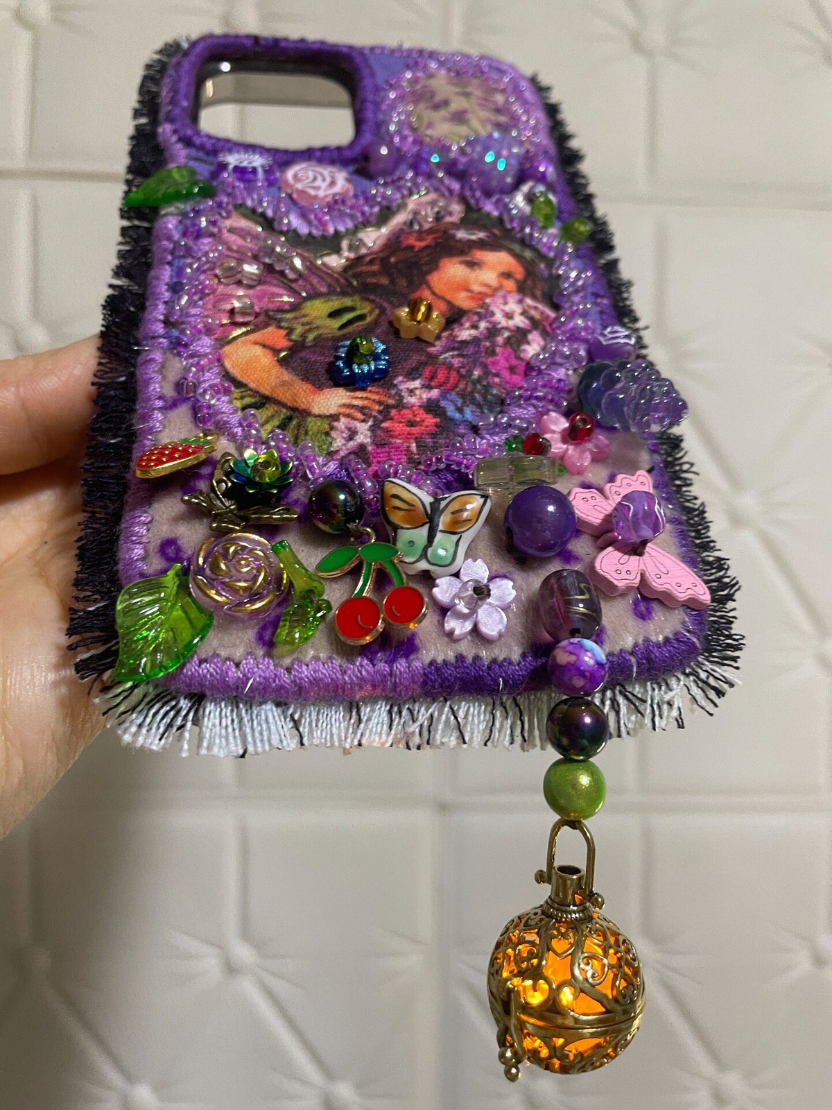 Handcrafted Beaded Phone Case with Fringe Trim