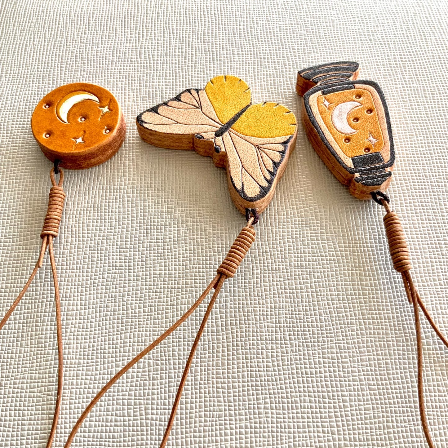 Italian Vegetable-Tanned Leather Butterfly, Lantern, and Moon Star Charms Set
