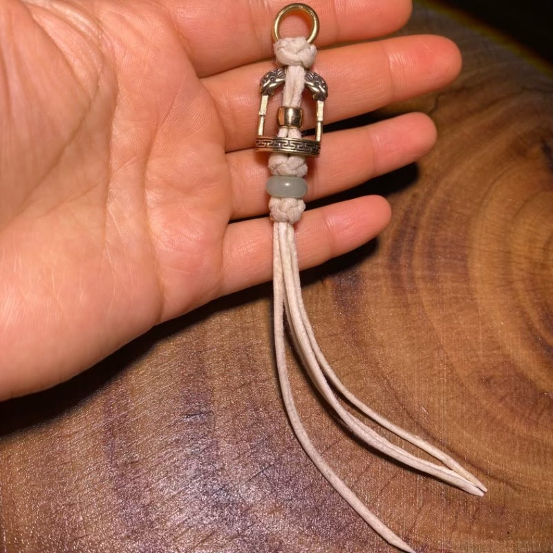 Brass Stirrup Pendant with Leather Tassel