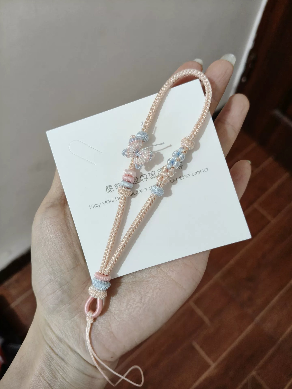 ハンドメイド編み込みスマホストラップ ブルー×ピンク グラデーション