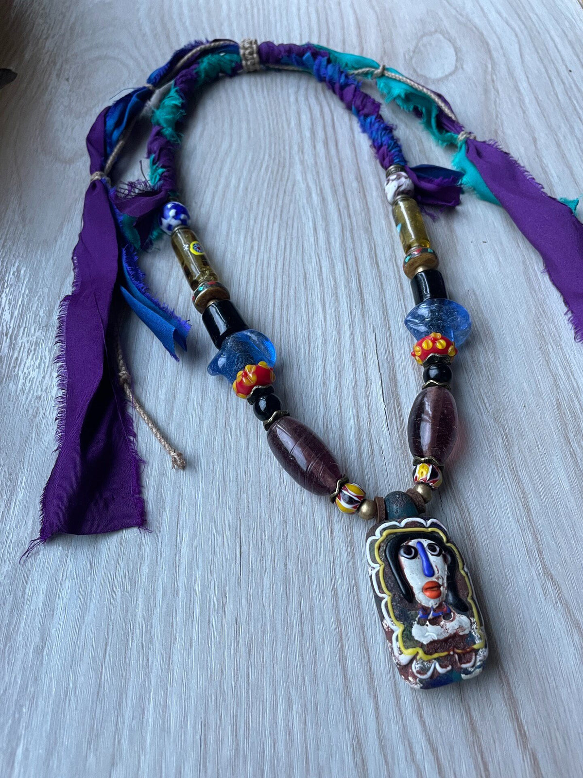 Phoenician Doll Glass Pendant Necklace