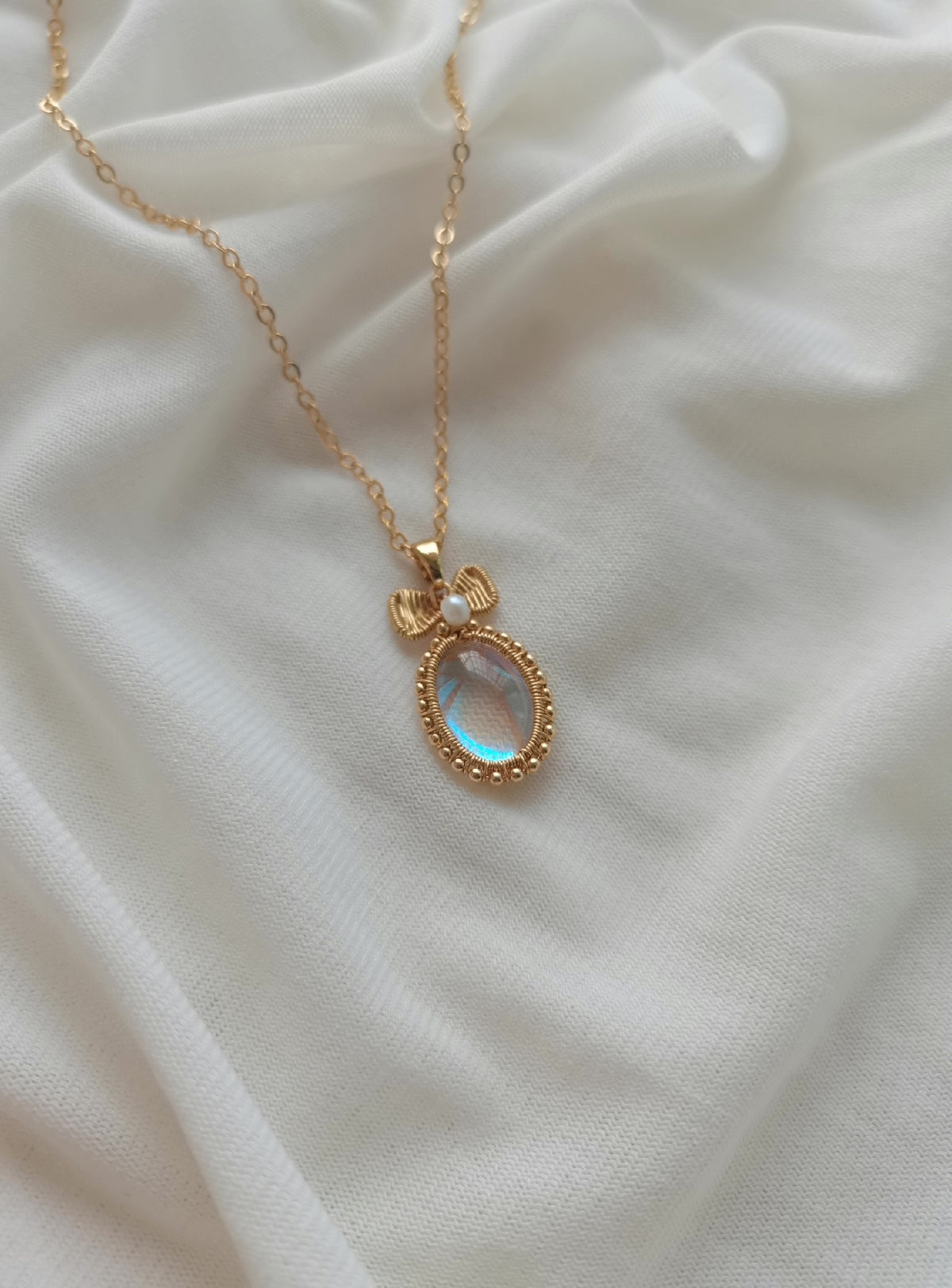 Blue Moonlight Glass Bow Pendant Necklace