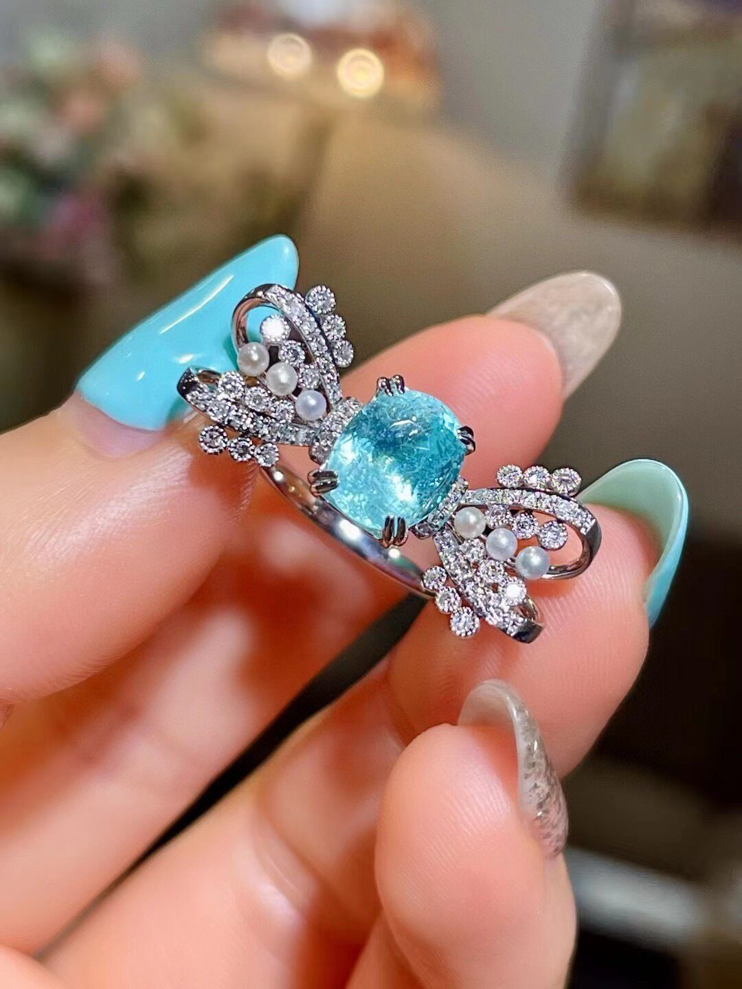 18k Gold Ring with Cushion-Cut Neon Blue Gem, Diamond and Pearl Bow-Tie Wings