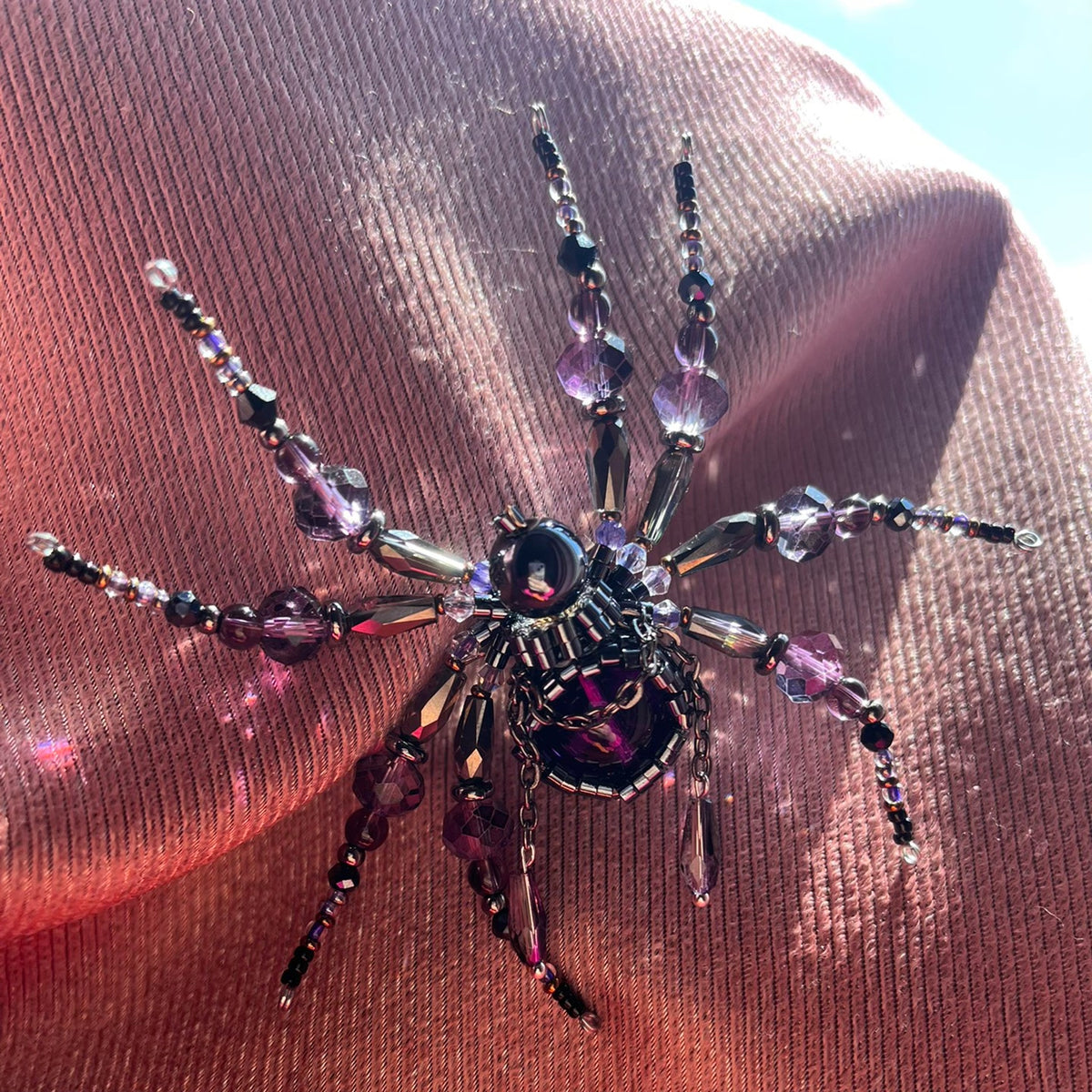 Collana artigianale con ciondolo ragno viola