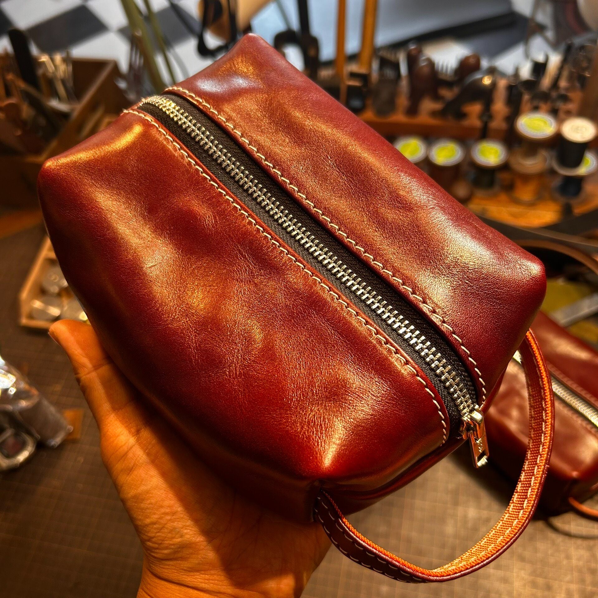 Reddish-Brown Full-Grain Leather Rectangular Pouch with Dual-Zipper Closure