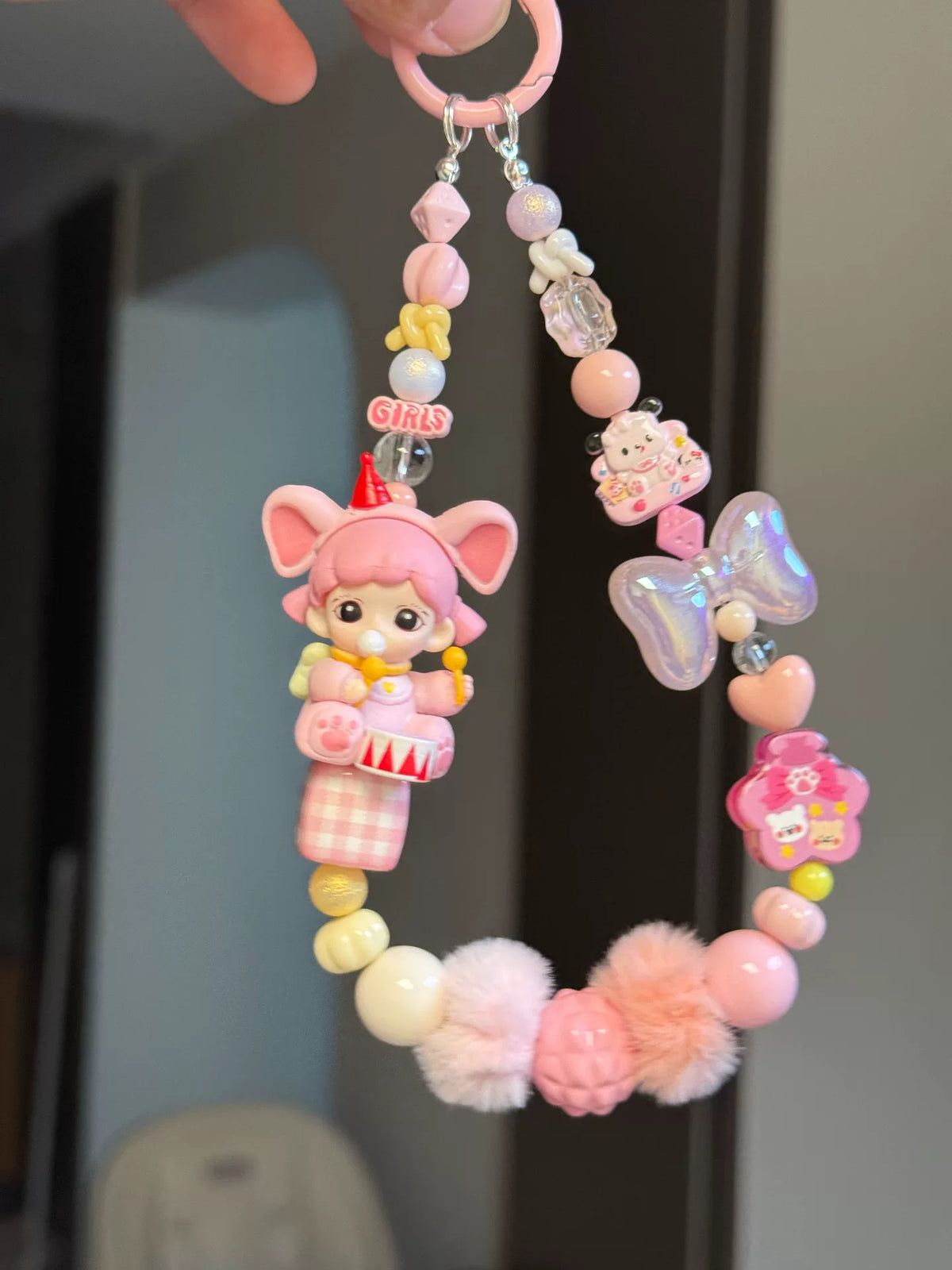 ピンクの人形スマホストラップ バッグチャーム キーホルダー