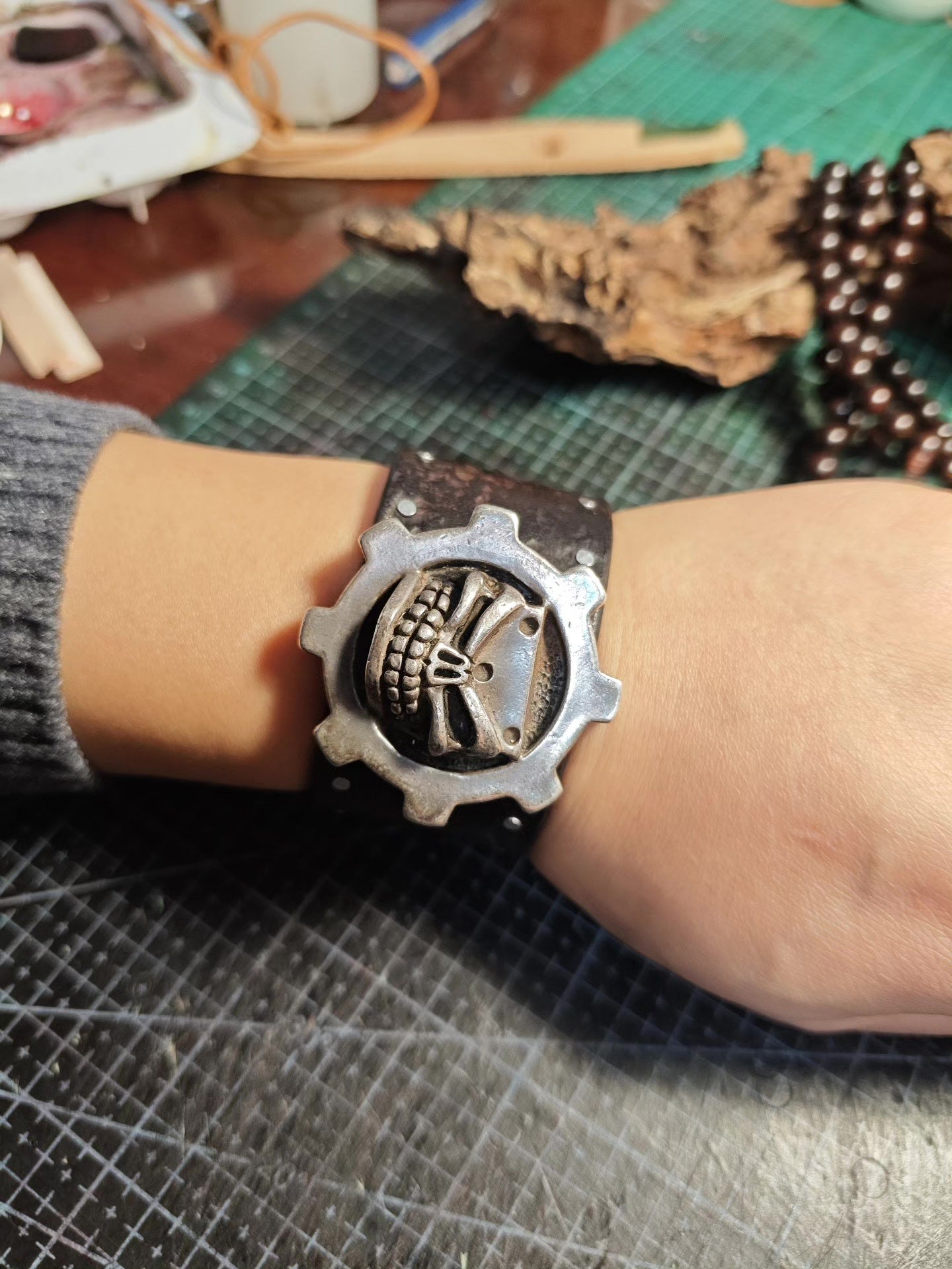Steampunk Leather Cuff Bracelet with Skull and Gear Emblem