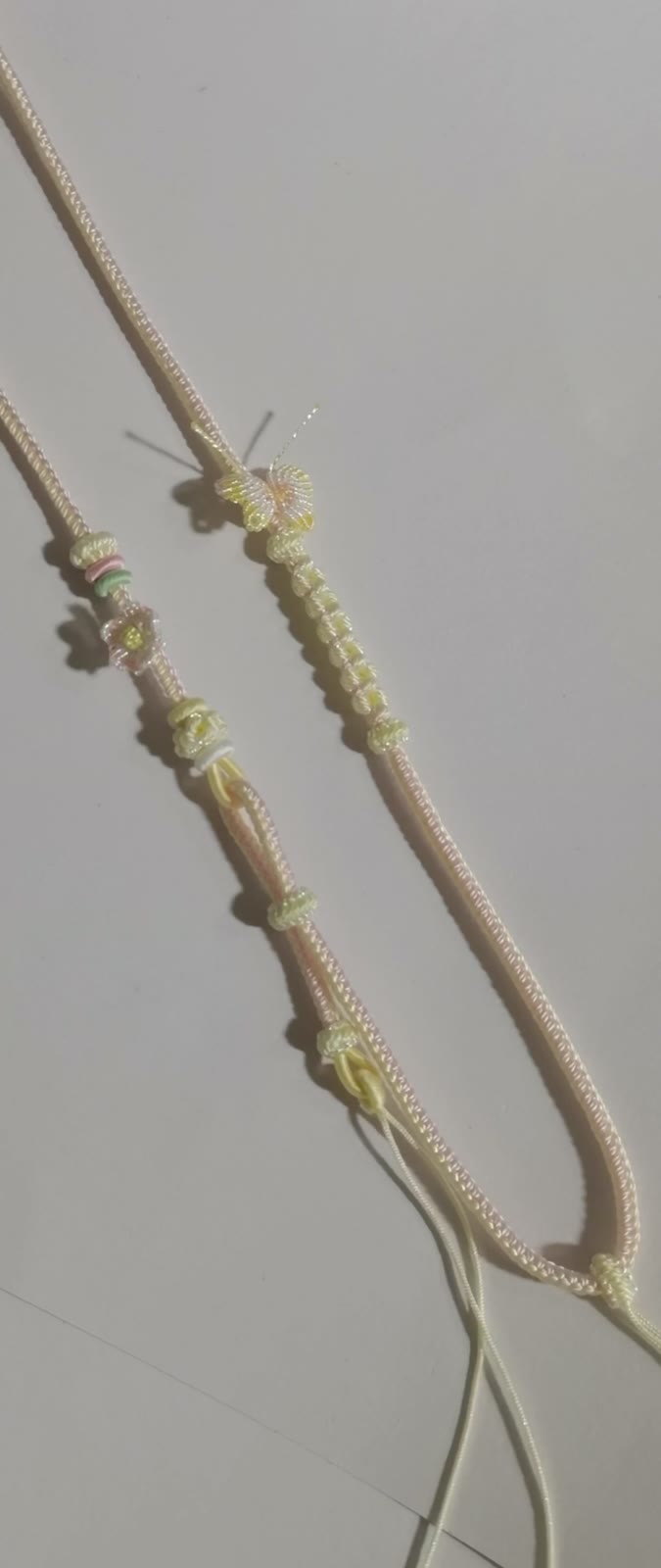 Cordon de collier tressé artisanal dégradé rose et vert