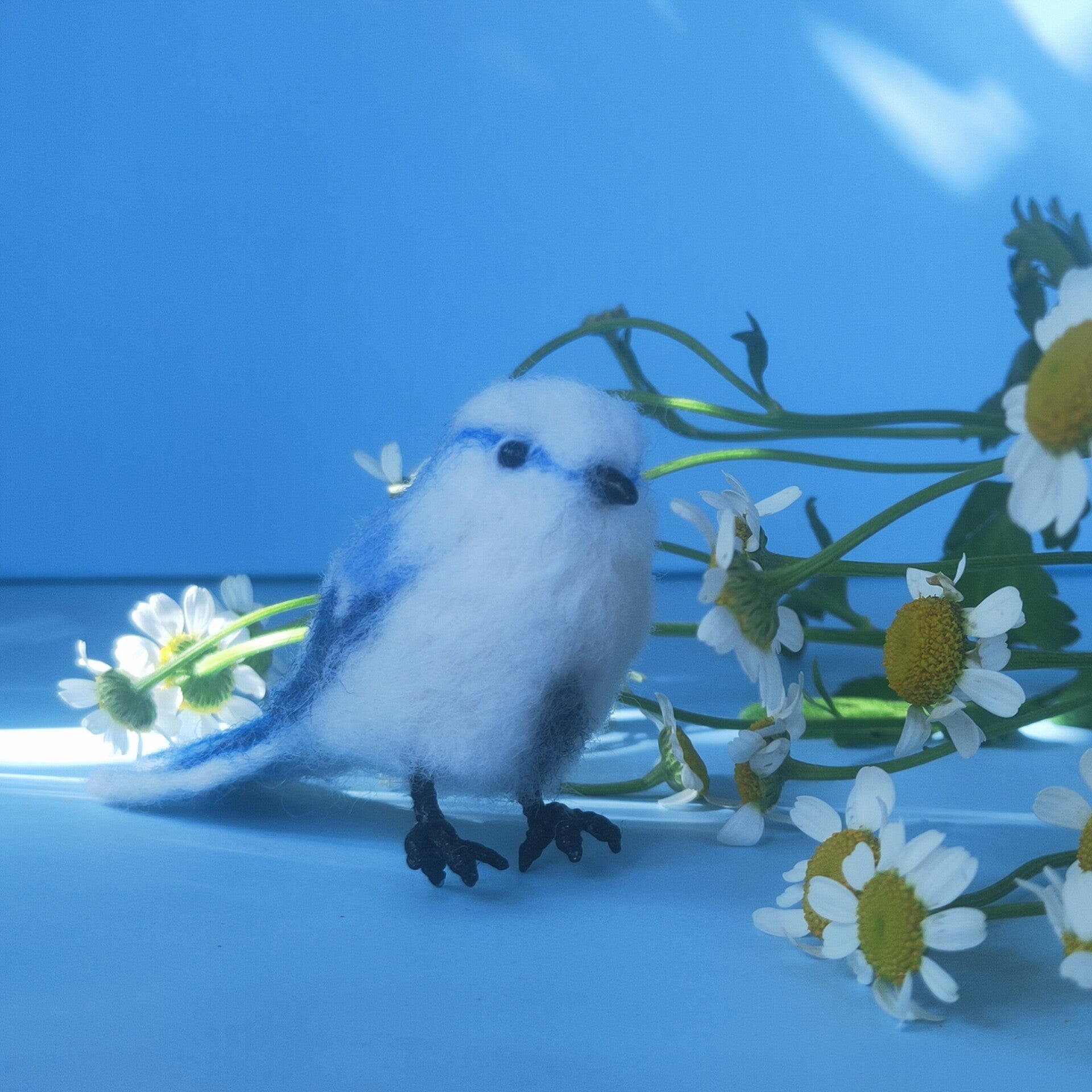 Needle-Felted Wool Miniature Bird Figurine with Blue and White Plumage