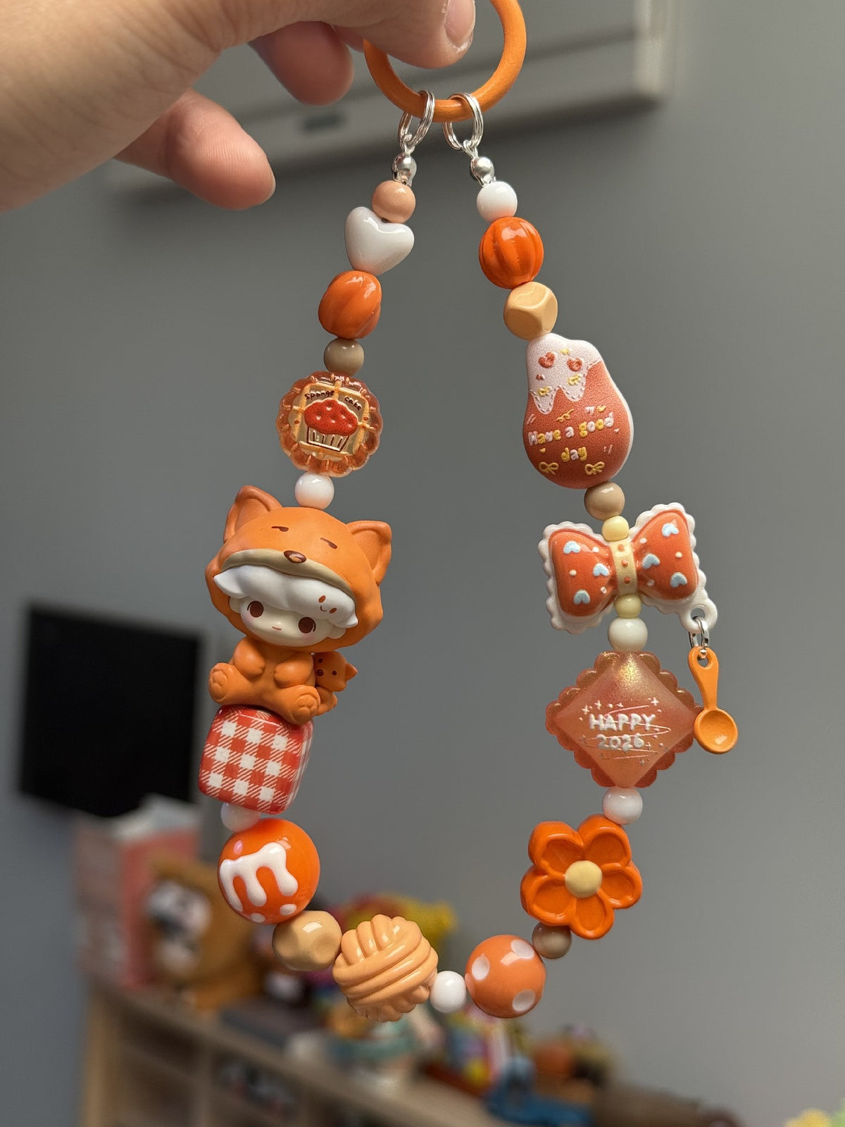 Dimoo Orange Onesie Beaded Phone Strap Charm