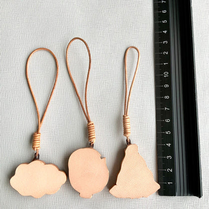 Handcrafted Leather Charm Set with Cartoon Motifs