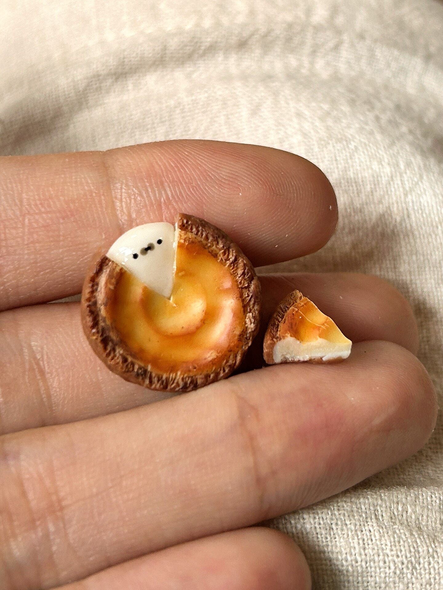 Miniature Cheesecake Replica with Ghost Figure and Cutaway Slice