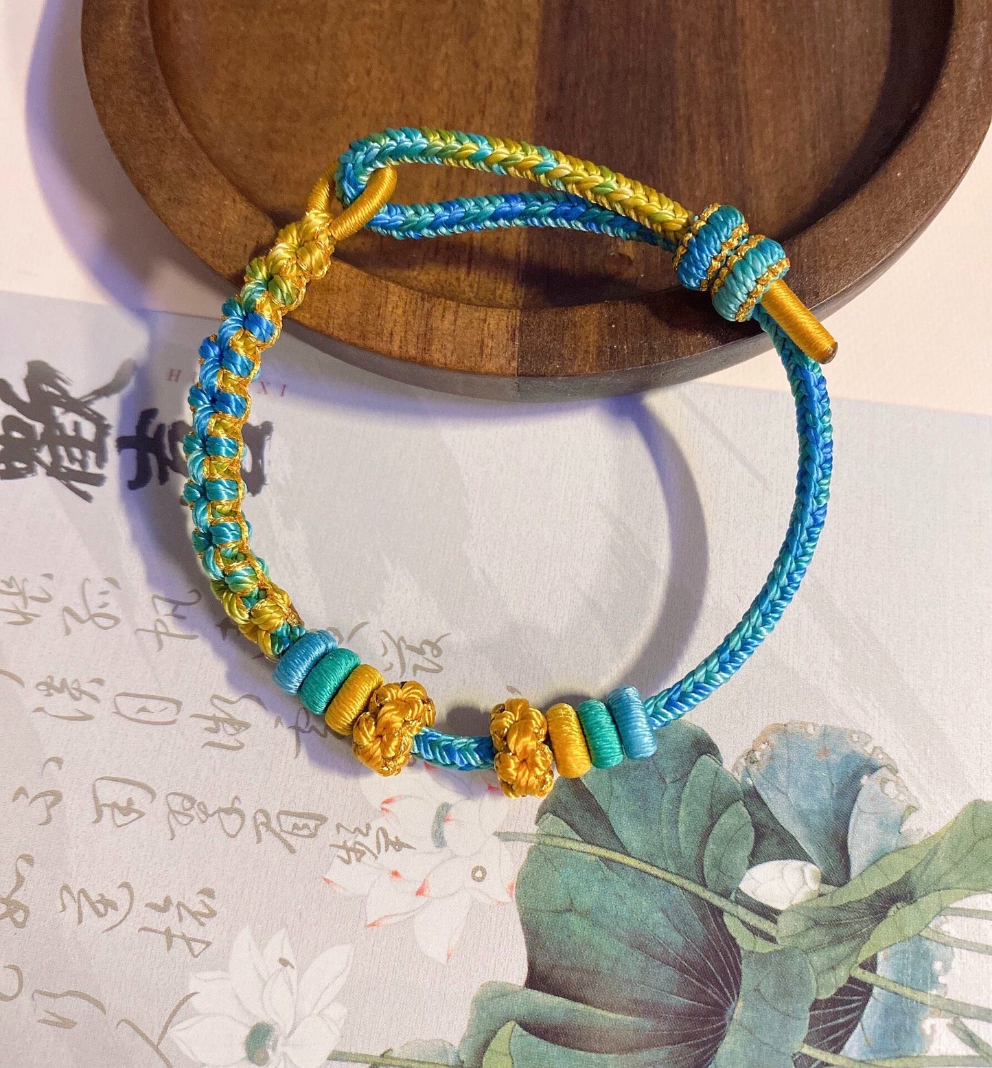 Handwoven Blue and Yellow Cord Bracelet with Beads